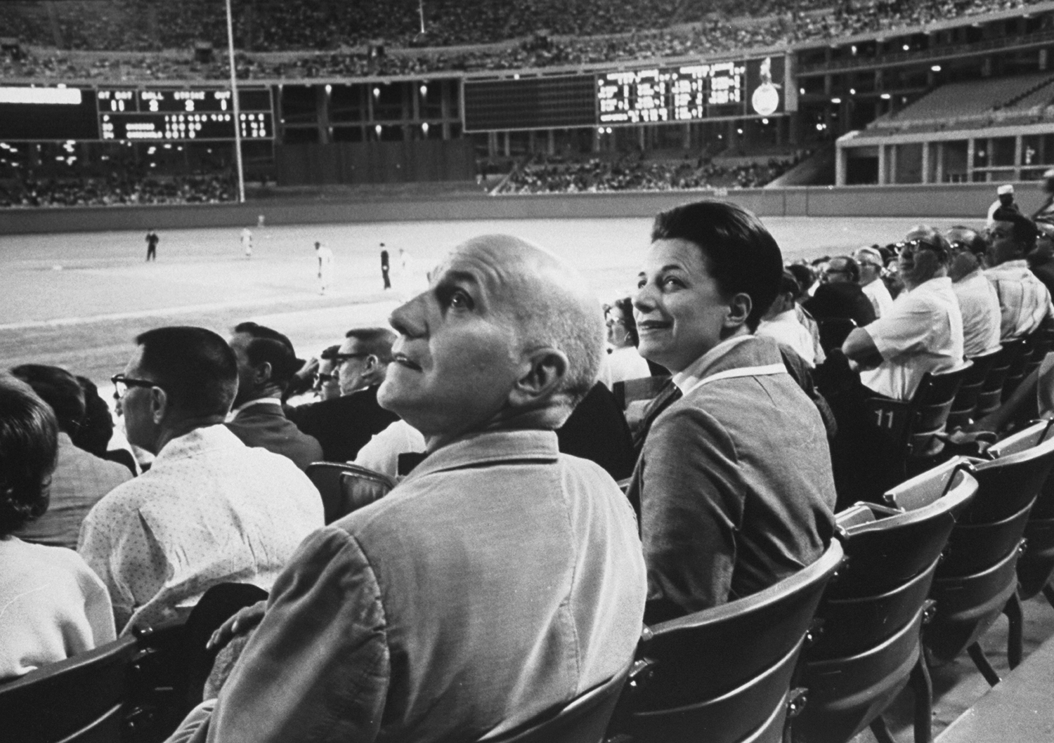 "Dr. Masters with Mrs. Johnson, watching St. Louis Cardinals play," 1966.