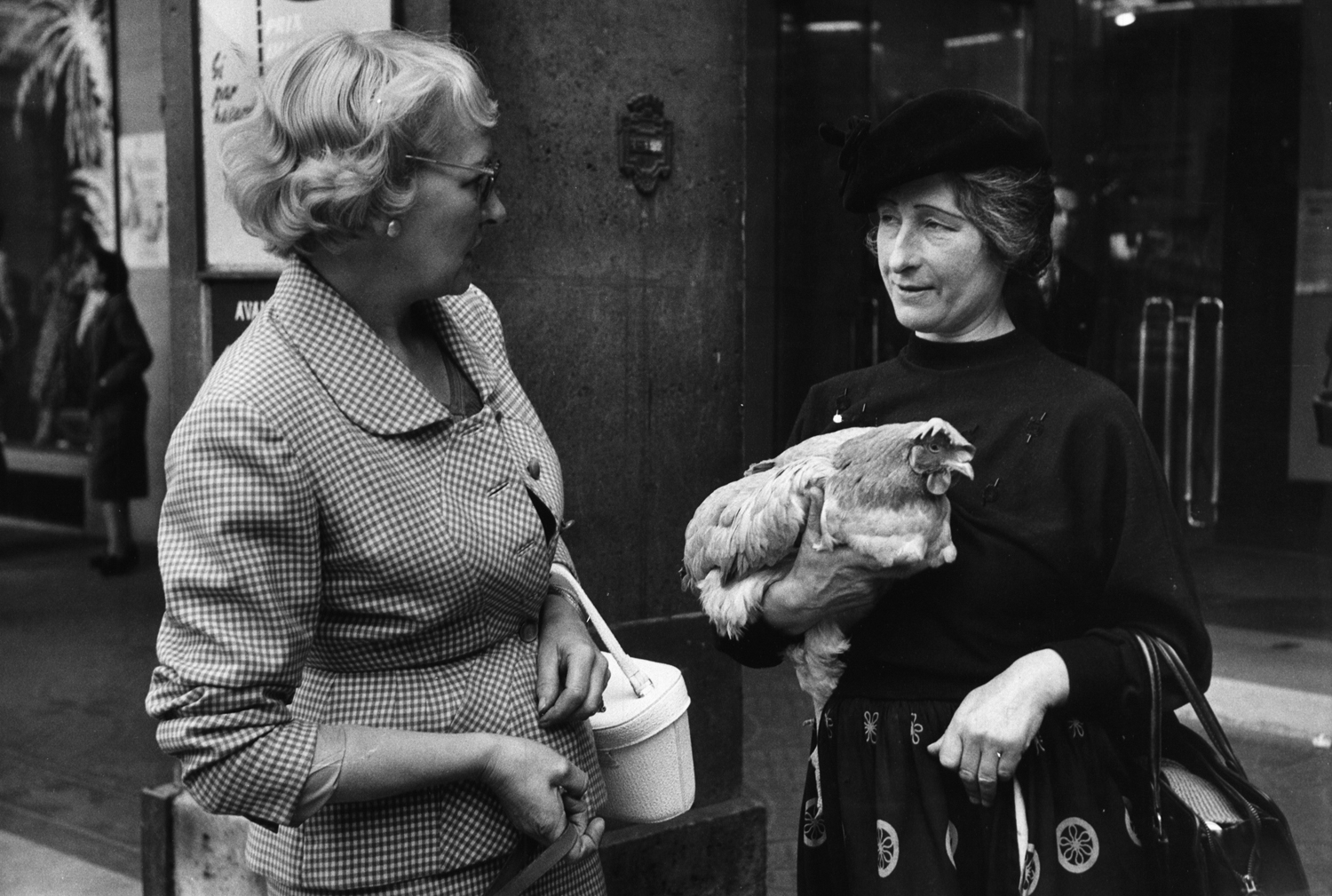 Marguerite (right) and her chicken, Paris, 1956.