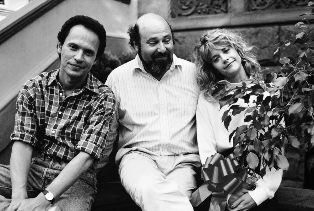 Billy Crystal, director Rob Reiner and Meg Ryan on the set of <i>When Harry Met Sally</i> (Columbia)