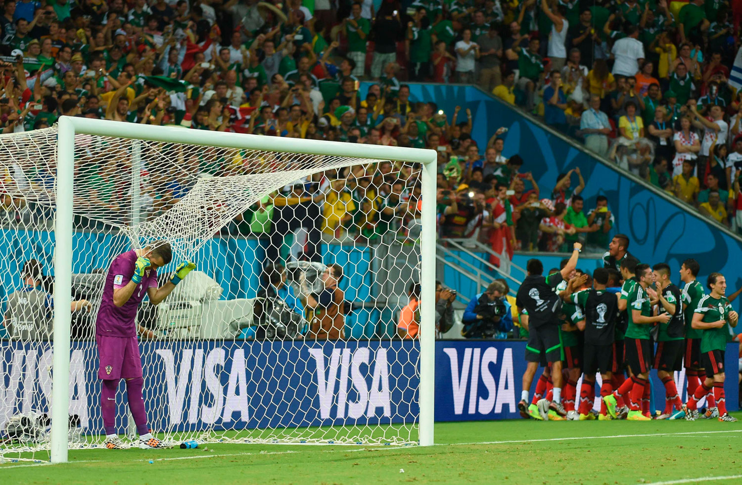 Croatia's goalkeeper Stipe Pletikosa reacts after Mexico scored in a match between Croatia and Mexico at the Pernambuco Arena in Recife, Brazil on June 23, 2014.
