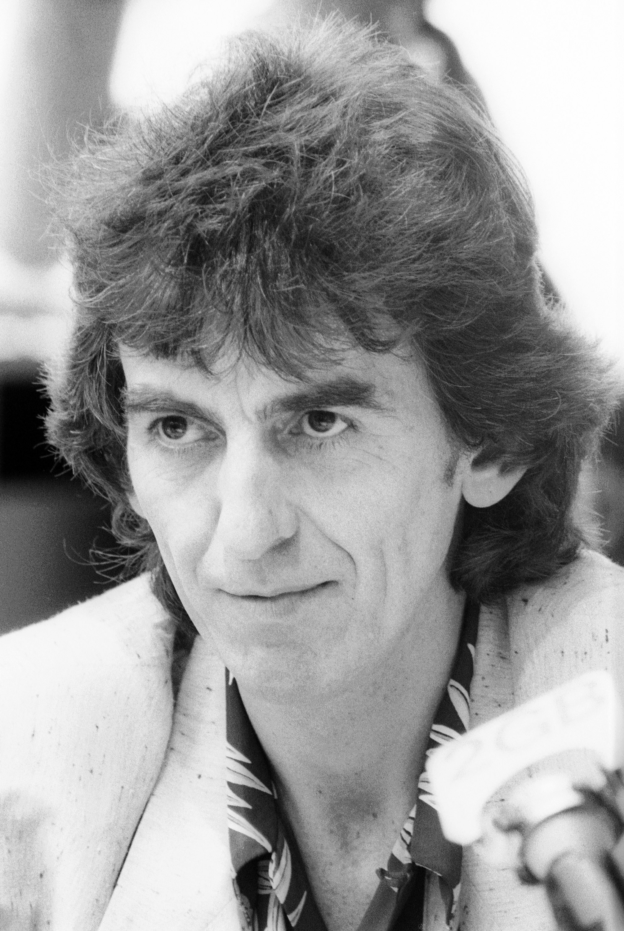 Musician and former member of 'The Beatles' George Harrison attends a press conference to launch the new book by Derek Taylor 'Fifty Years Adrift' at the Sydney Opera House on November 30, 1984 (Peter Carrette Archive&mdash;Getty Images)