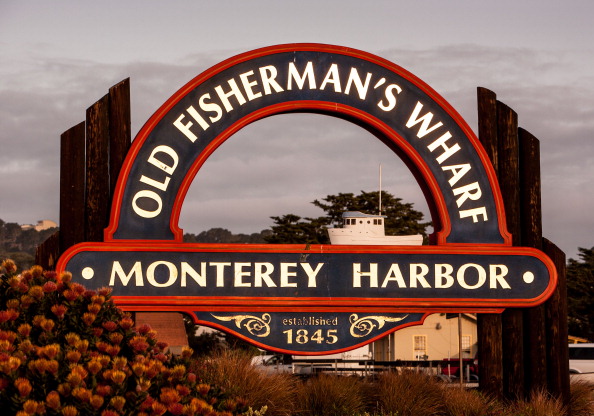 The entrance to Old Fisherman's Wharf at sunrise in Monterey, Calif., on April 6, 2013 (George Rose—Getty Images)