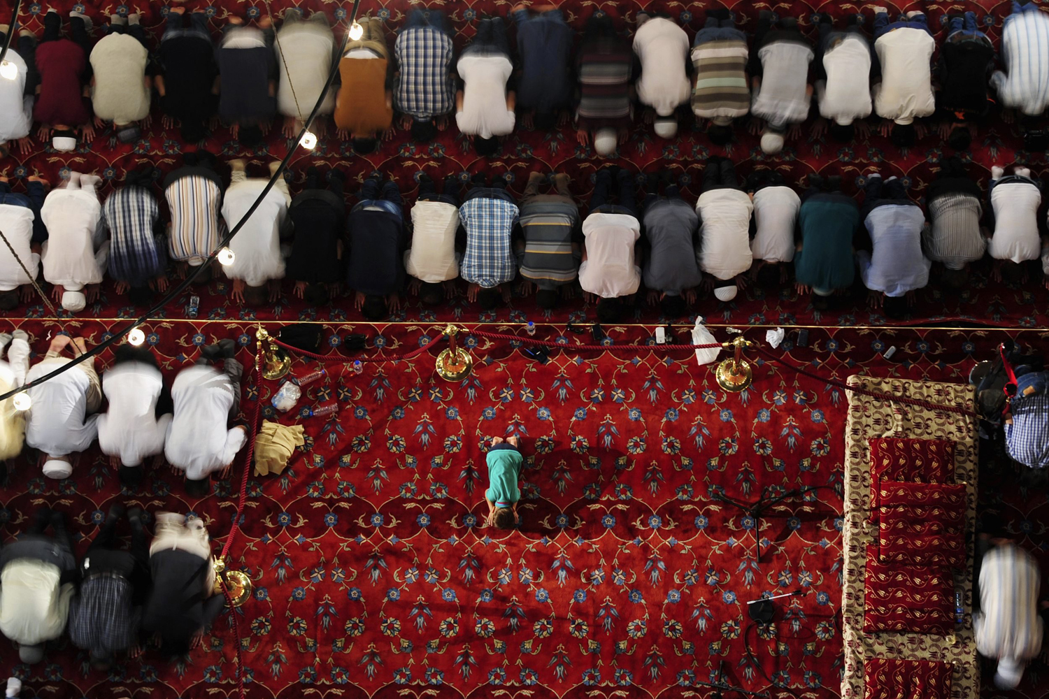 Faithful pray in Ottoman-era Sultanahmet mosque during Ramadan, in Istanbul