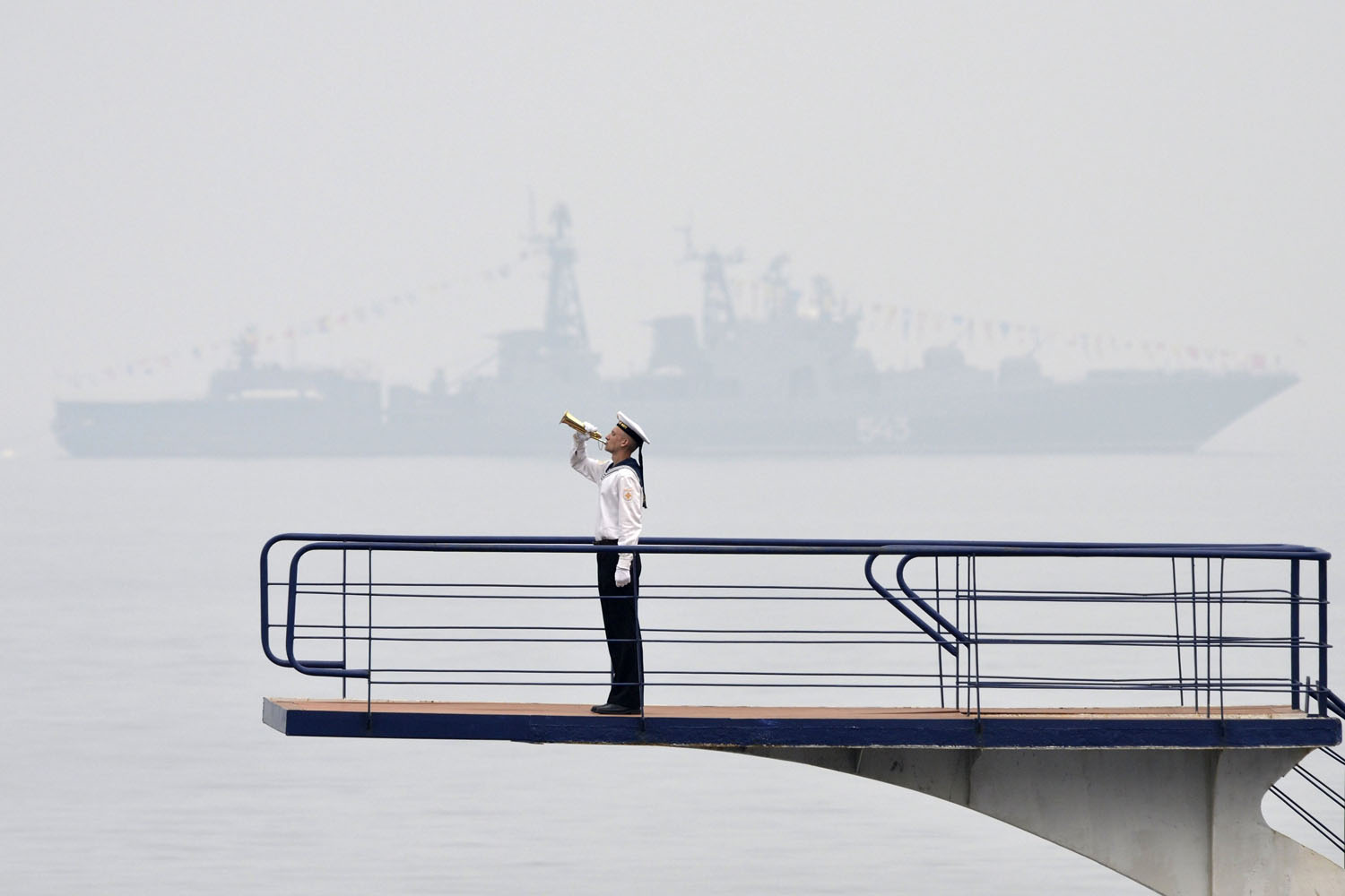 A Russian sailor takes part in a naval parade rehearsal in the far eastern port of Vladivostok