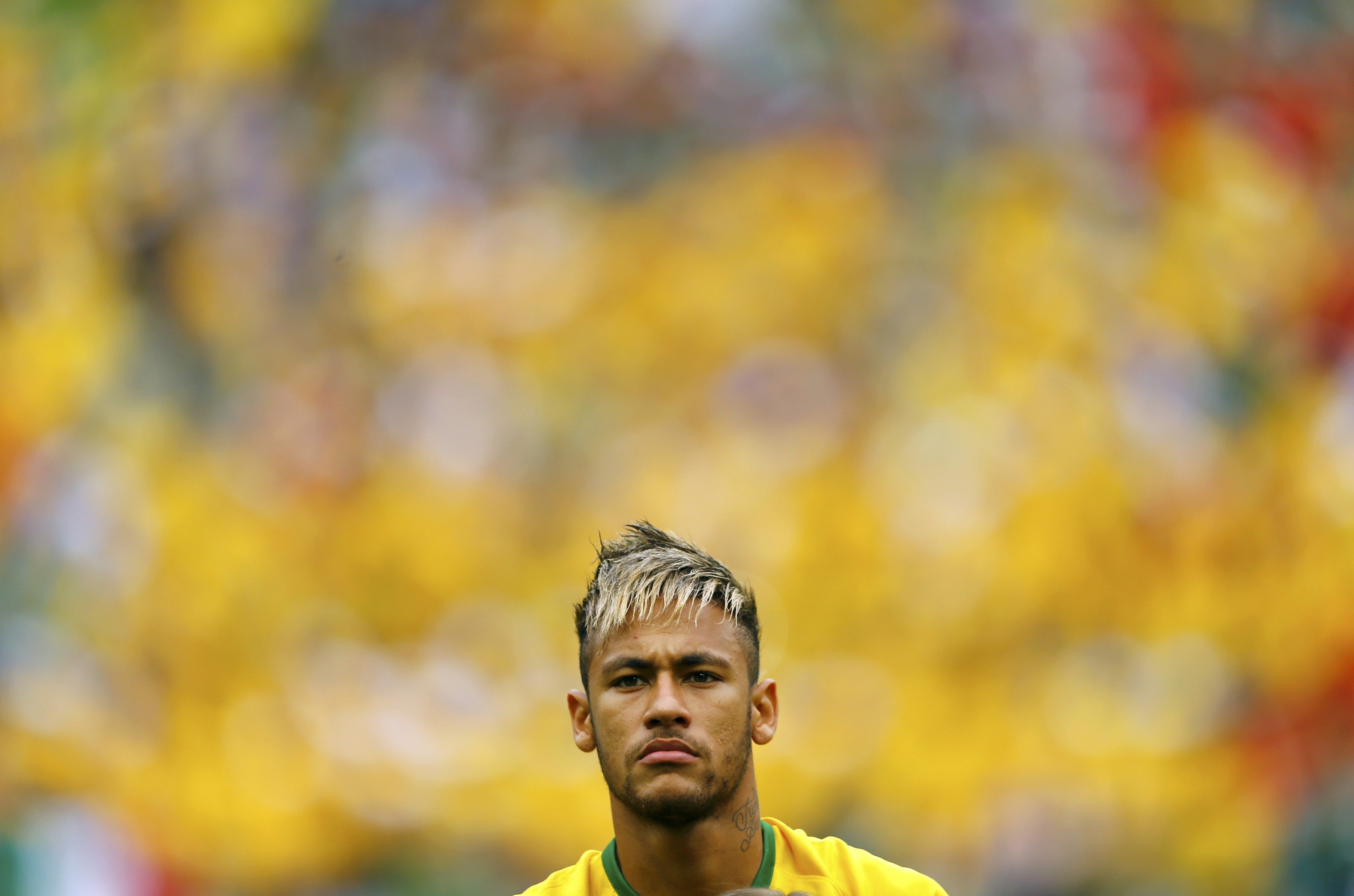 Brazil's Neymar stands during the 2014 World Cup Group A soccer match between Brazil and Mexico at the Castelao arena in Fortaleza June 17, 2014. REUTERS/Marcelo del Pozo (BRAZIL  - Tags: SOCCER SPORT WORLD CUP)