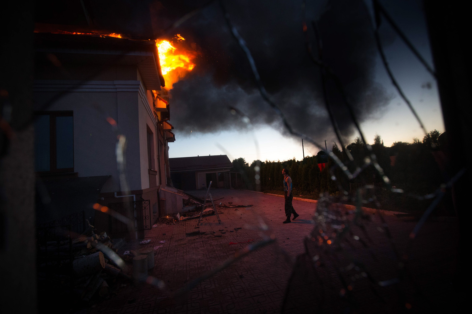 Aftermath of shell attack on Lugansk suburbs