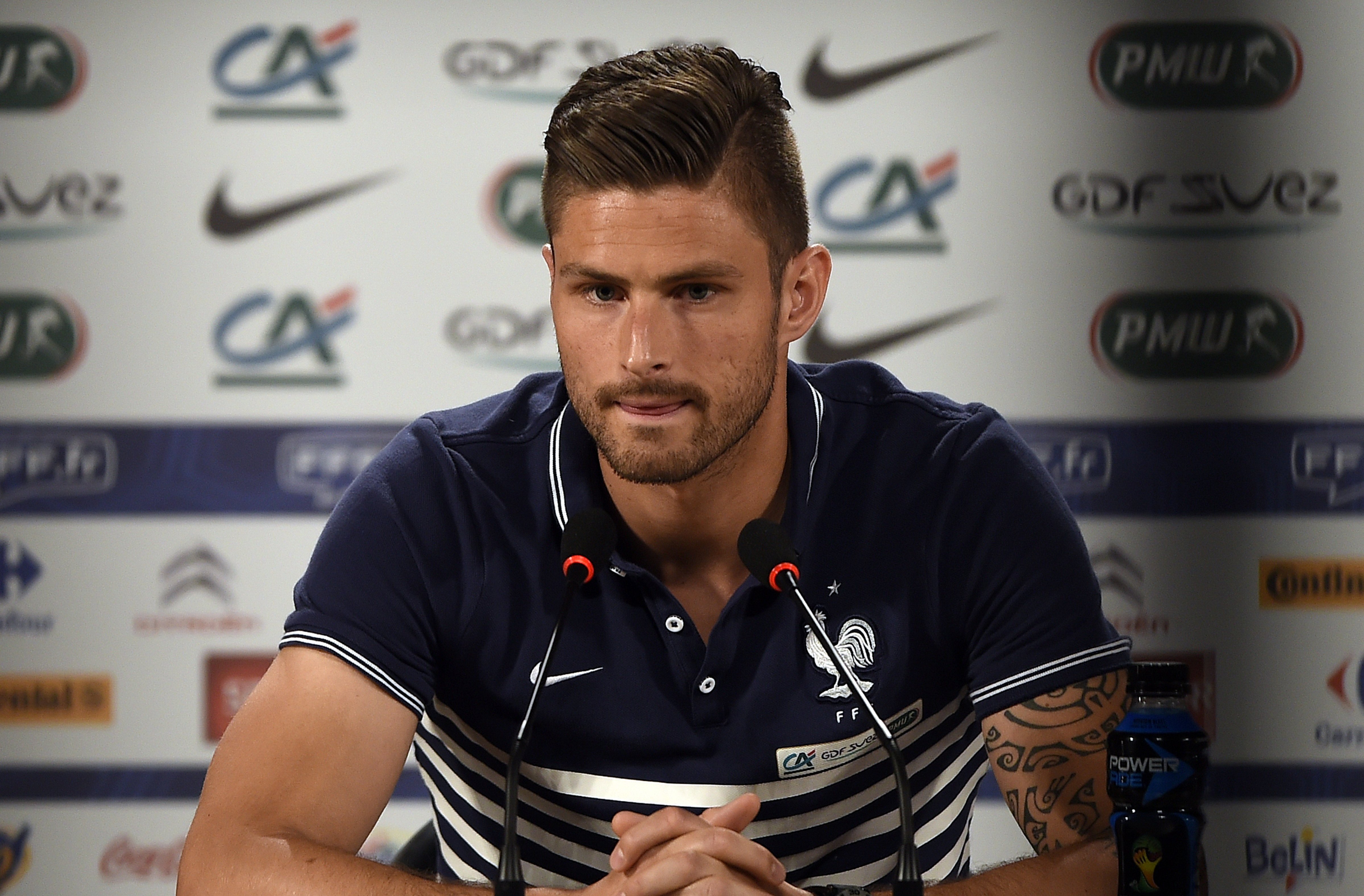 France's forward Olivier Giroud addresses a press conference at the theater in Ribeirao Prato on June 10, 2014, prior to the start of the 2014 FIFA World Cup in Brazil. (FRANCK FIFE—AFP/Getty Images)
