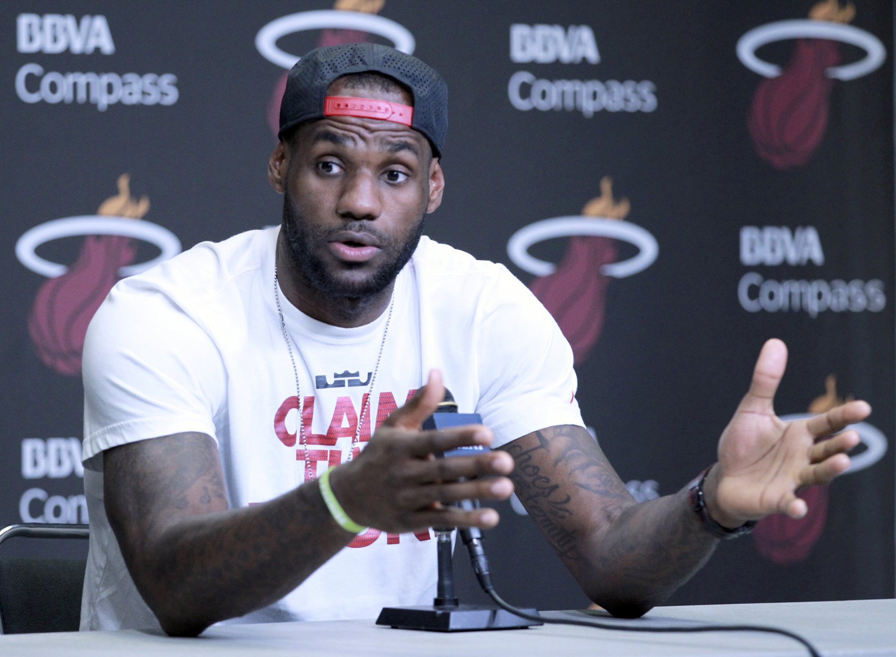 Miami Heat's LeBron James talks with the media during a press conference at the AmericanAirlines Arena on June 17, 2014, in Miami. (Miami Herald&mdash;MCT via Getty Images)
