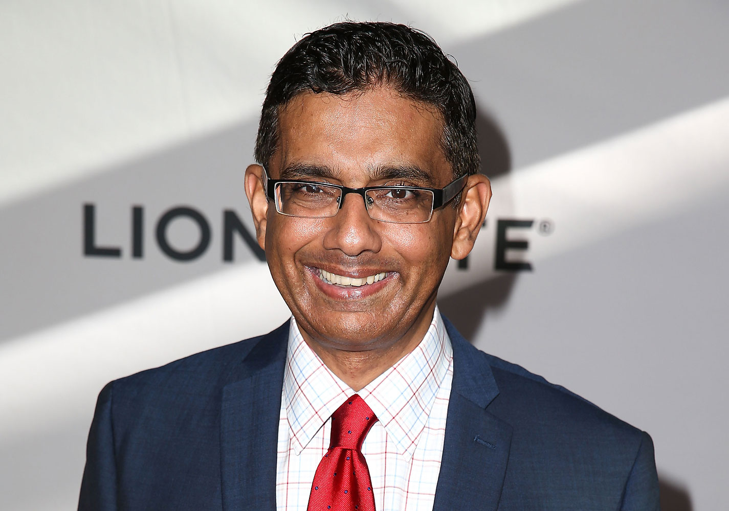 Filmmaker Dinesh D'Souza attends the premiere of Lionsgate Films' 'America' at Regal Cinemas L.A. Live on June 30, 2014 in Los Angeles. (Imeh Akpanudosen—Getty Images)