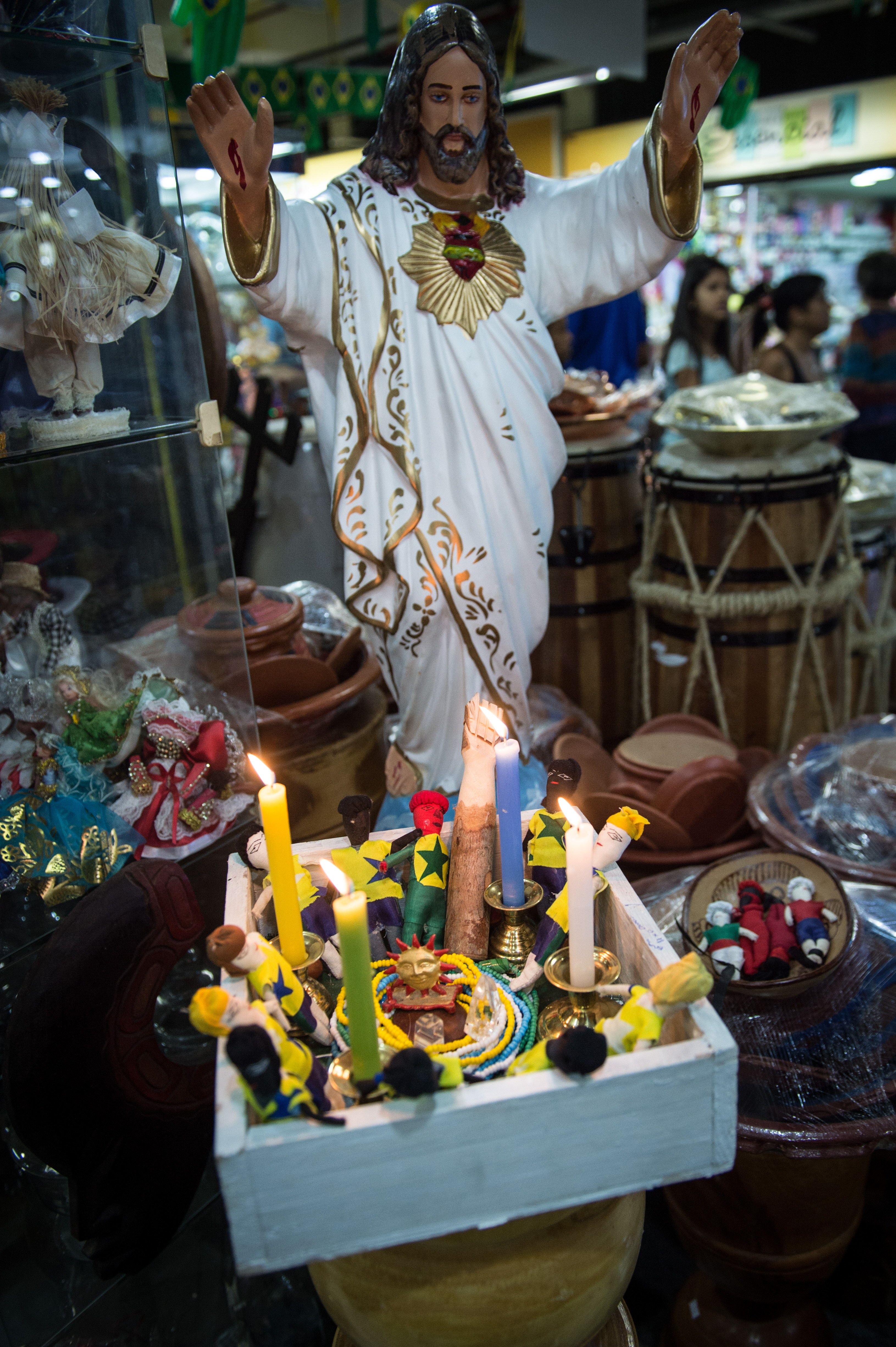An Afro-Brazilian ritual takes place at a religious-goods shop in Rio de Janeiro on July 3, 2014 (Yasuyoshi Chiba—AFP/Getty Images)
