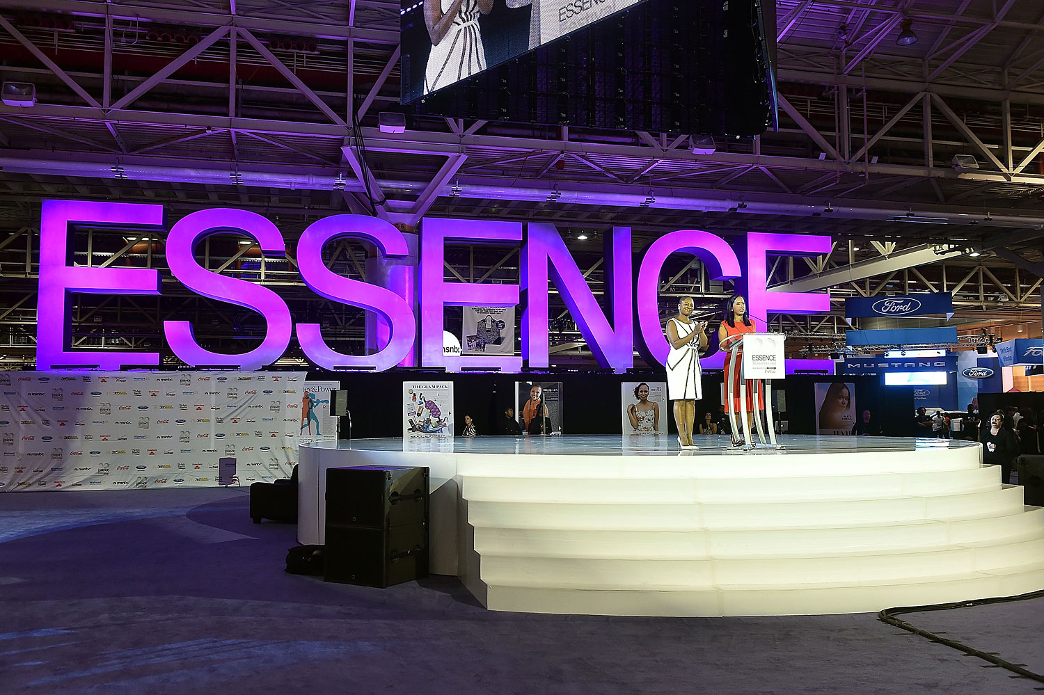 Vanessa K. Bush and Michelle Ebanks onstage at the 2014 Essence Music Festival on July 4, 2014 in New Orleans. (Paras Griffin—Getty Images)