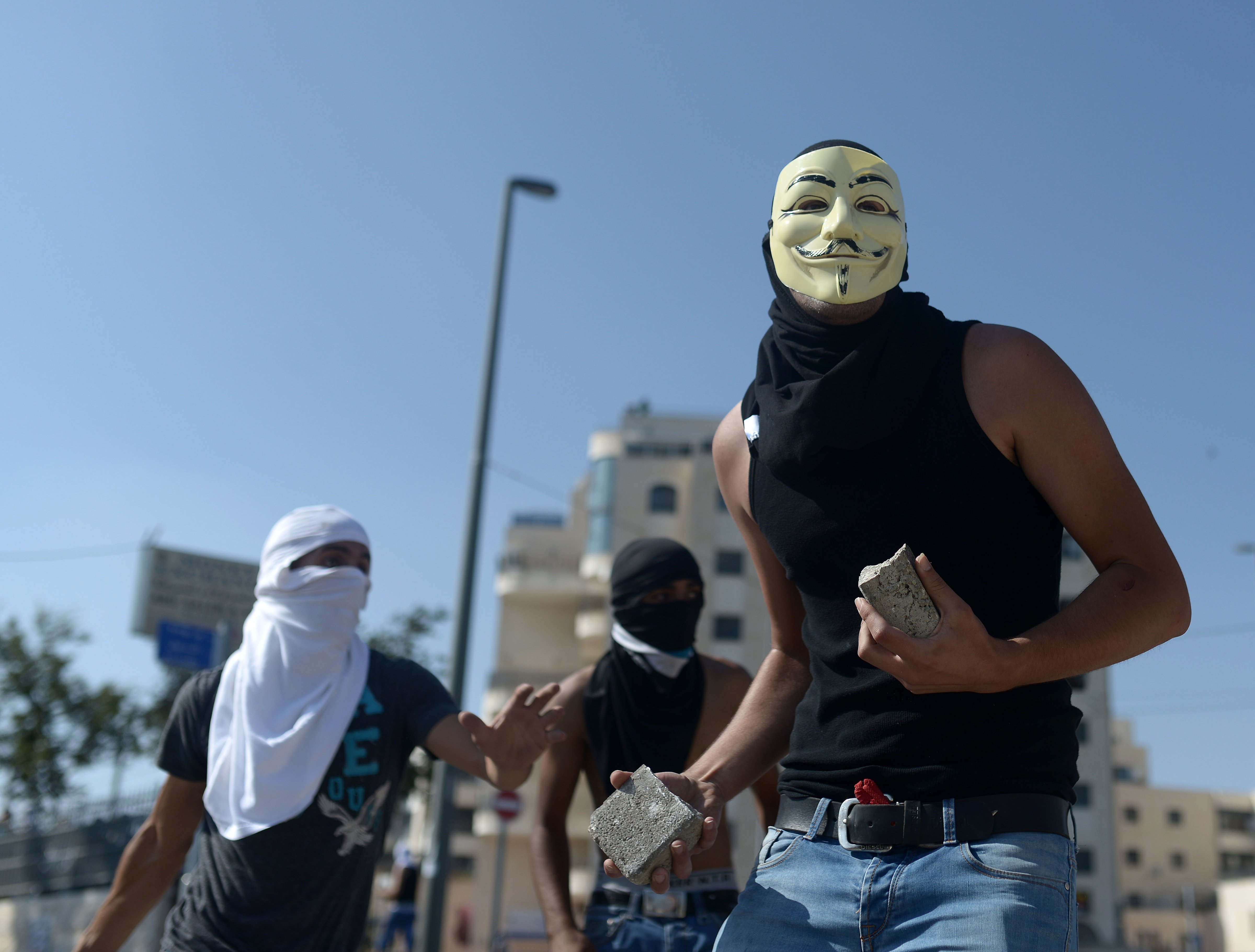 Clashes occurred between Israeli security forces and Palestinian youths during the funeral ceremony held for Muhammad Abu Kdear in Jerusalem on July 4, 2014. (Salih Zeki Fazlioglu—Anadolu Agency/Getty Images)