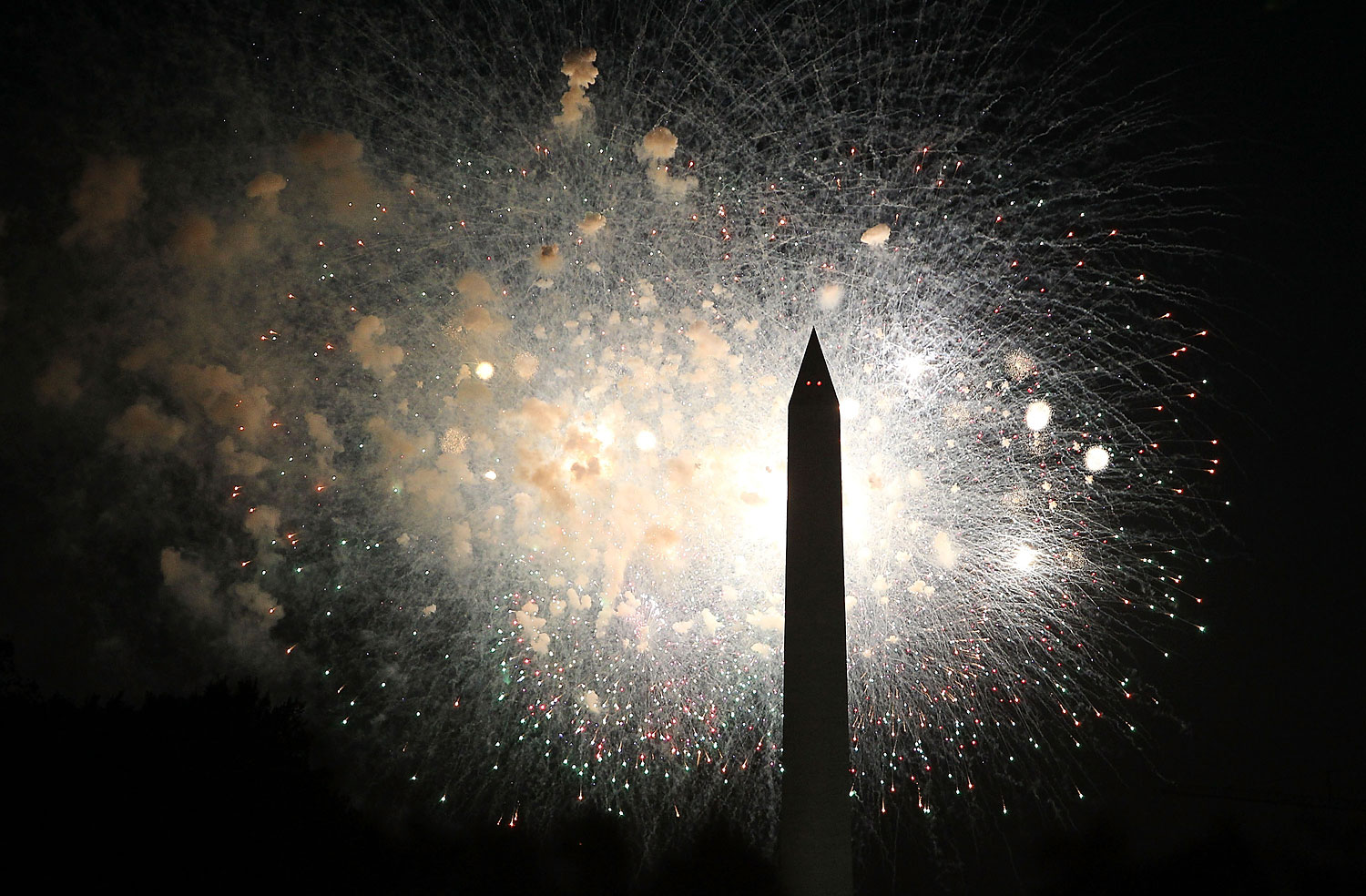 Fireworks display during PBS's 2014 A Capitol Fourth on the West Lawn in Washington.