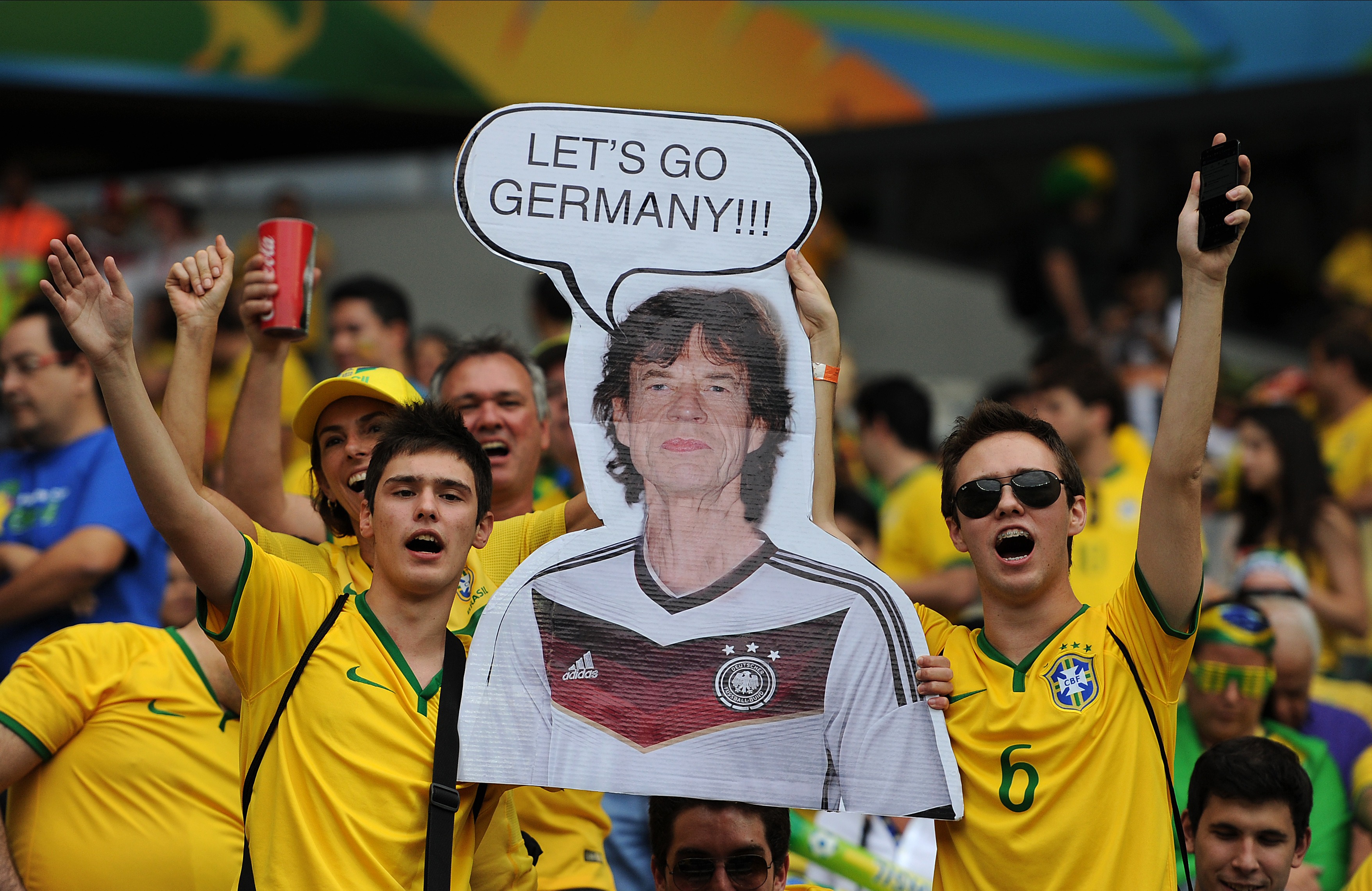 Brazil fans hold up a poster of Mick Jagger during the World Cup semifinal match between Brazil and Germany in Belo Horizonte, Brazil, on July 8, 2014 (Chris Brunskill Ltd/Getty)