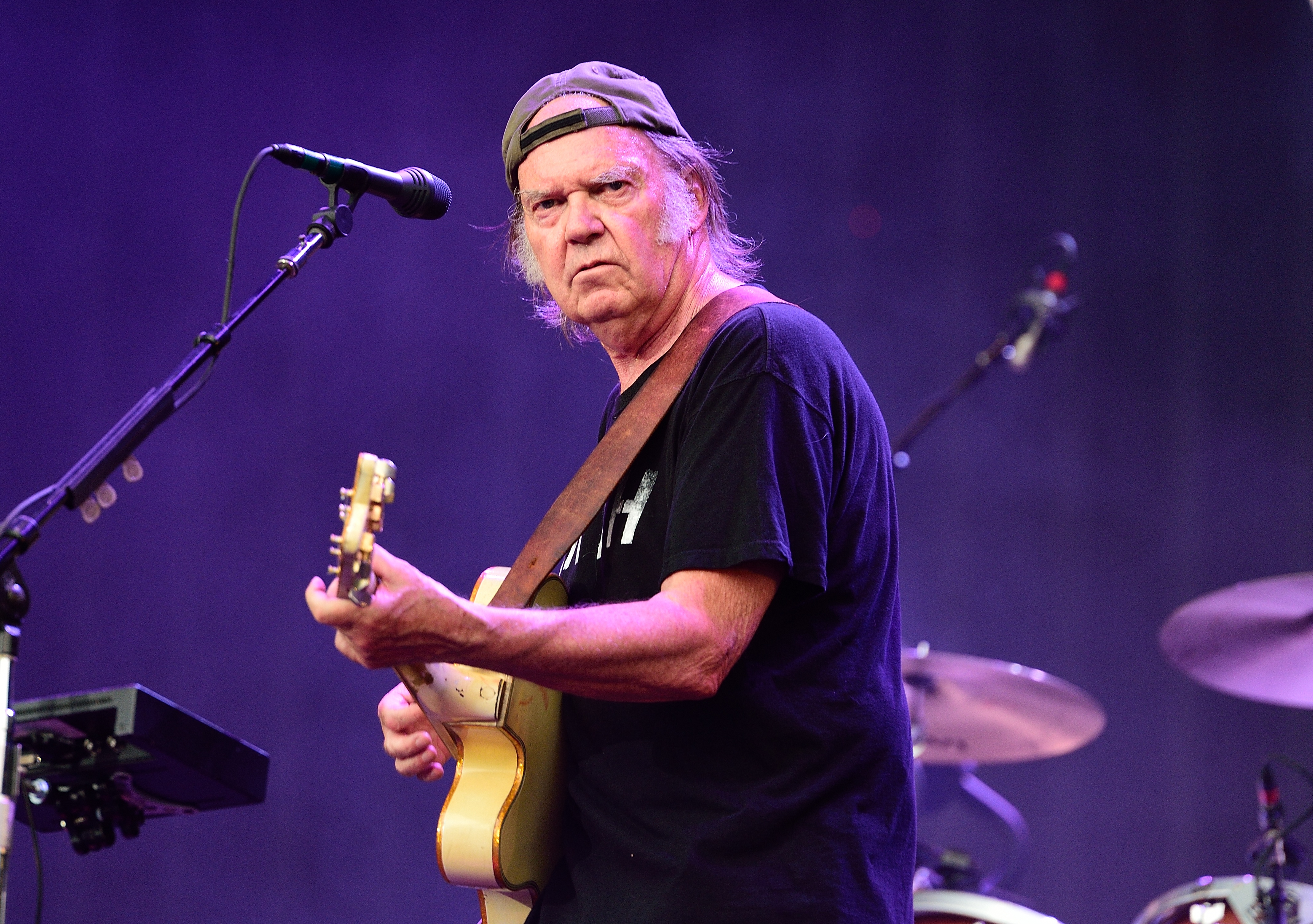 Neil Young of Neil Young and Crazy Horse performs on stage at British Summer Time Festival at Hyde Park on July 12, 2014 in London, United Kingdom. (Gus Stewart—Redferns/Getty Images)