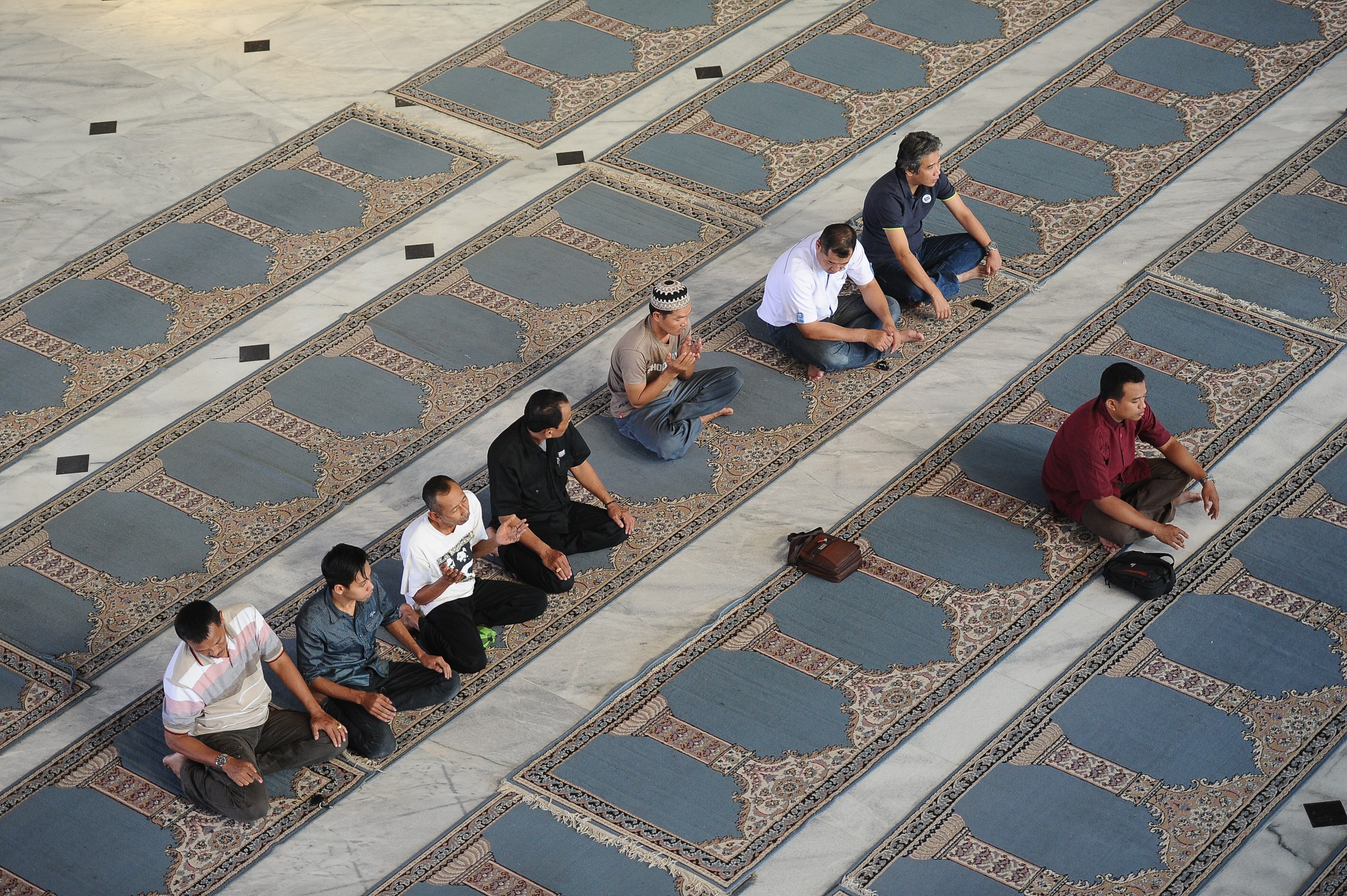 Muslims pray before breaking of the fast during Ramadan on July 13, 2014 in Surabaya, Indonesia. (Robertus Pudyanto&mdash;Getty Images)