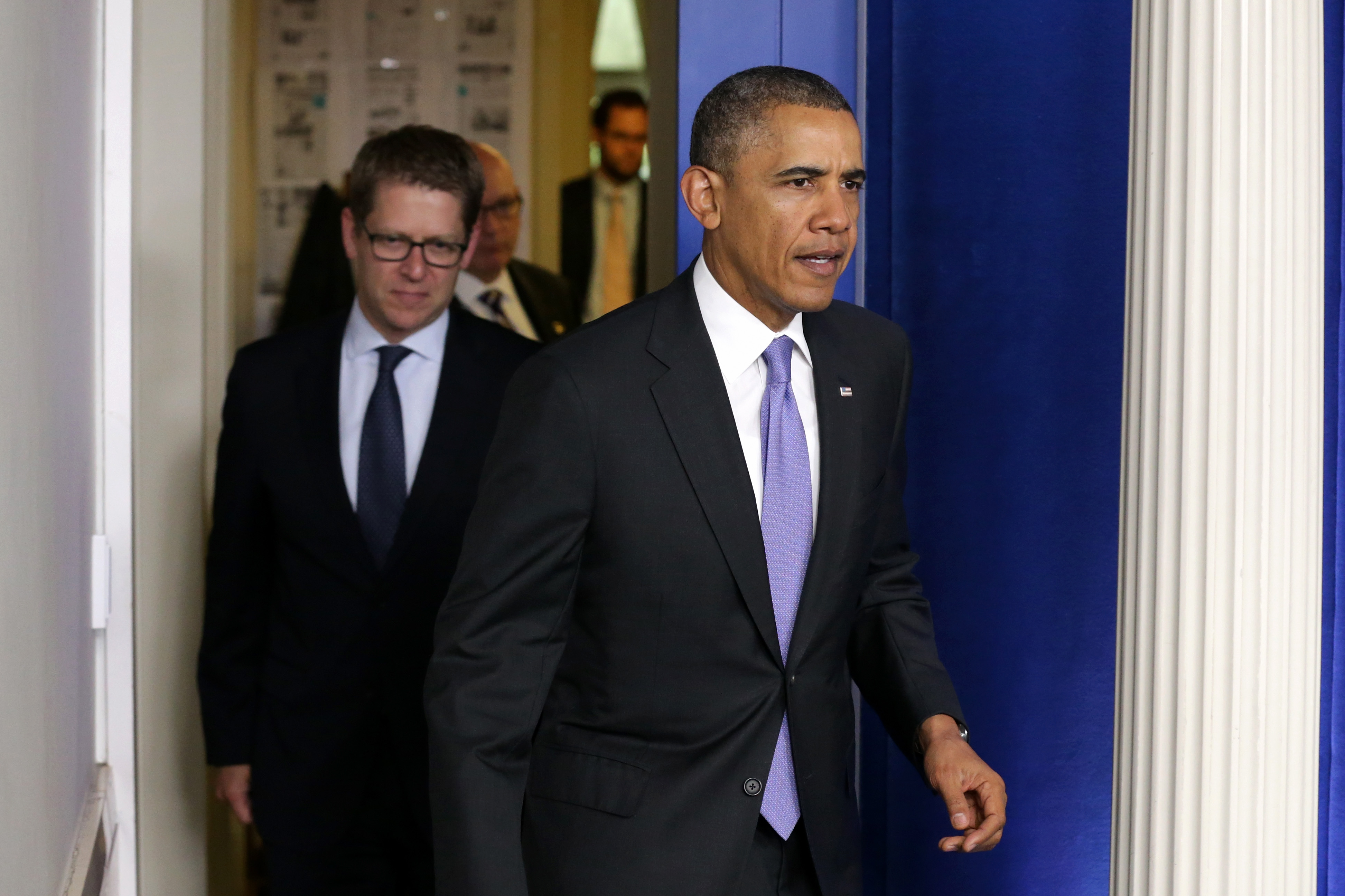 U.S. President Barack Obama (R) arrives to make a statement to the news media about the recent problems at the Veterans Affairs Department with White House Press Secretary Jay Carney in the Brady Press Briefing Room at the White House May 21, 2014 in Washington, DC. (Chip Somodevilla&mdash;Getty Images)