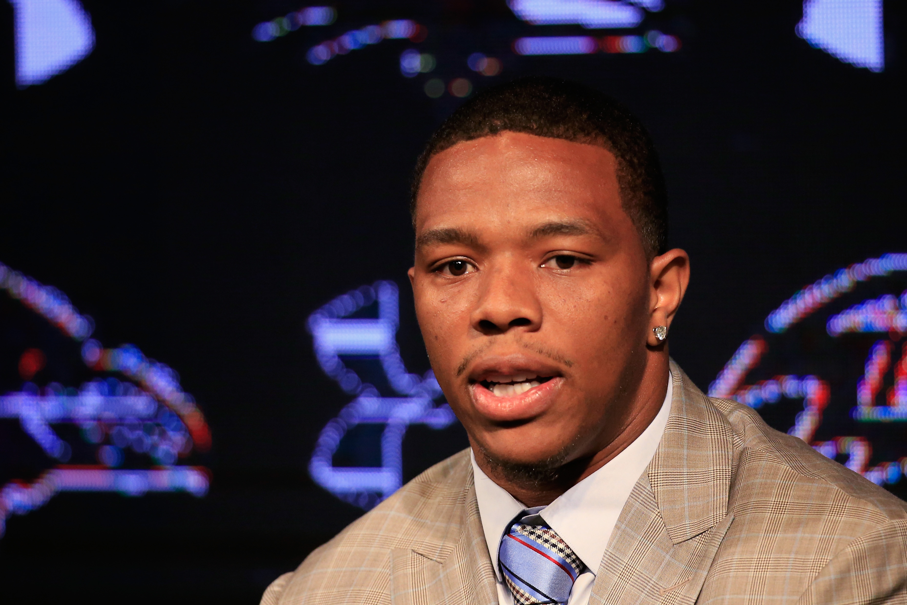 Running back Ray Rice of the Baltimore Ravens addresses a news conference at the Ravens training center on May 23, 2014 in Owings Mills, Maryland. (Rob Carr—Getty Images)