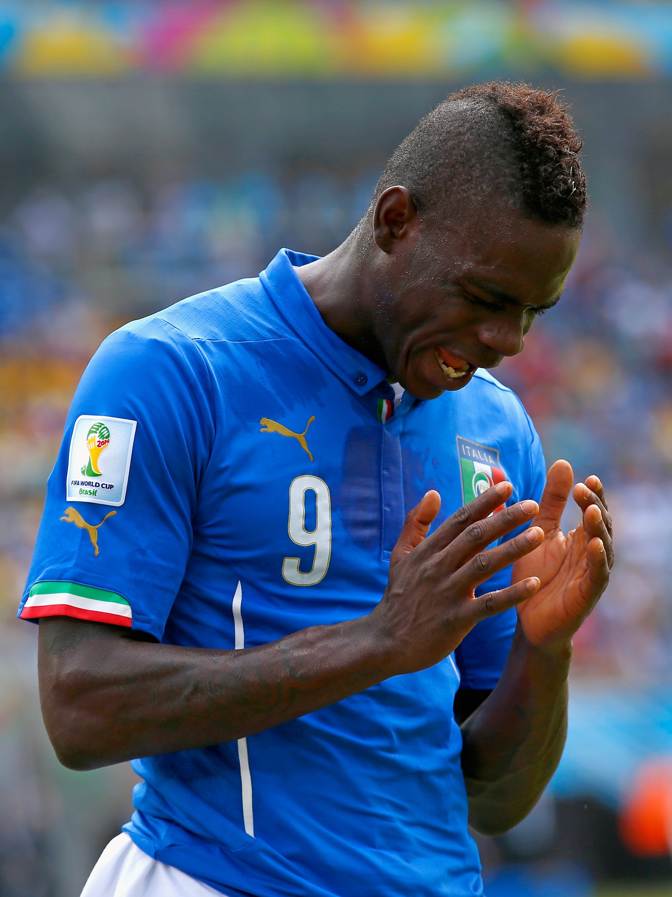 Mario Balotelli of Italy reacts during the match between Italy and Uruguay at Estadio das Dunas on June 24, 2014 in Natal, Brazil.