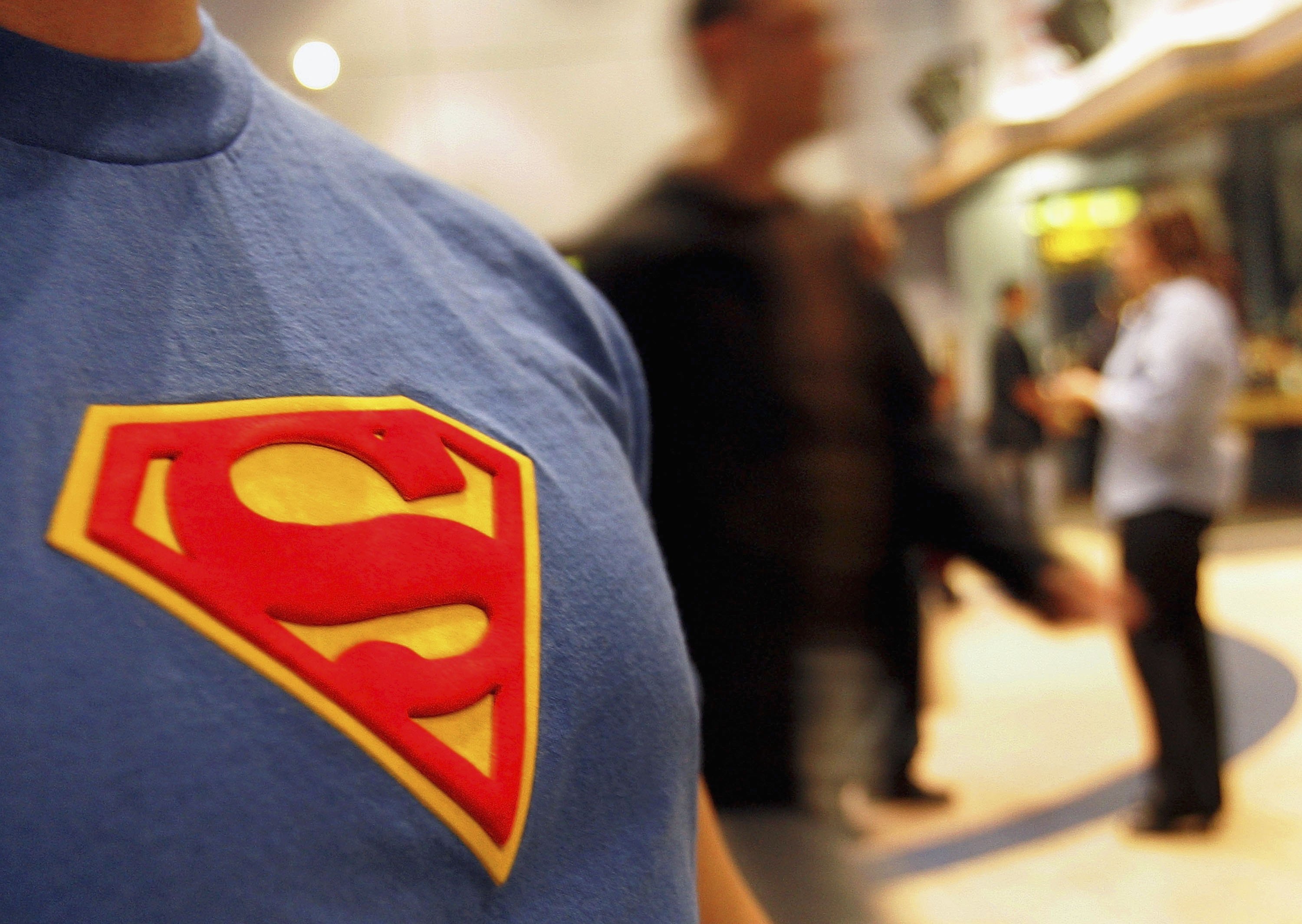 CHICAGO - JUNE 27: A moviegoer wearing his Superman tee-shirt is seen in the lobby prior to watching the new Superman Returns movie on June 27, 2006 in Chicago, Illinois. The theater had a special showing of the much anticipated new Superman movie at 10pm. (Photo by Tim Boyle/Getty Images) (Tim Boyle&mdash;Getty Images)