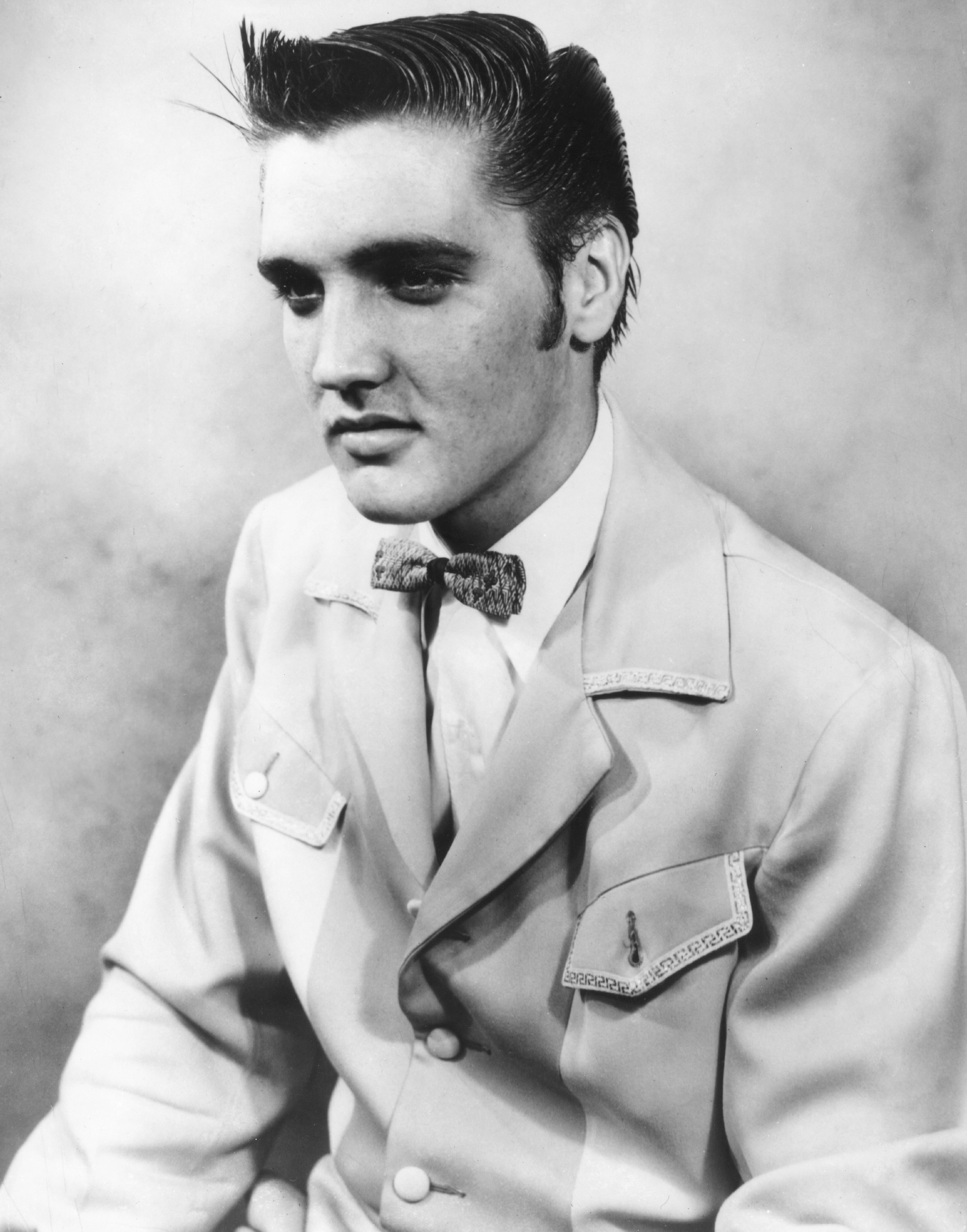 Elvis Presley photographed at The Memphis Press-Scimitar offices, July 27, 1954. This photo ran with Elvis's first profile in the newspaper the following day.