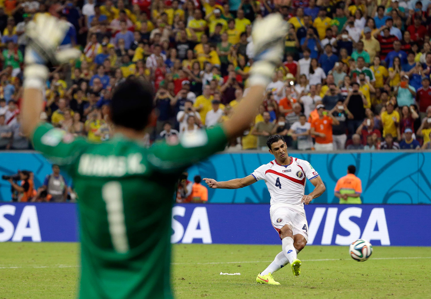 Costa Rica's goalkeeper Keylor Navas reacts as Michael Umana takes the winning kick in a penalty shootout at the Arena Pernambuco in Recife, Brazil on June 29, 2014.