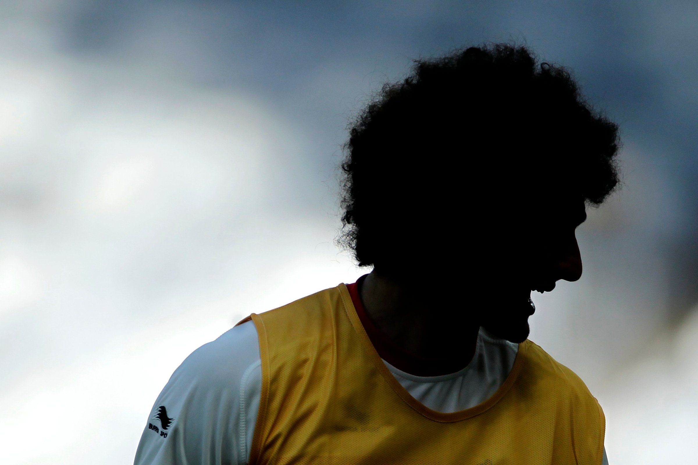 Belgiumís Marouane Fellaini laughs during a training session at the Mineirao Stadium in Belo Horizonte, Brazil on June 16, 2014.