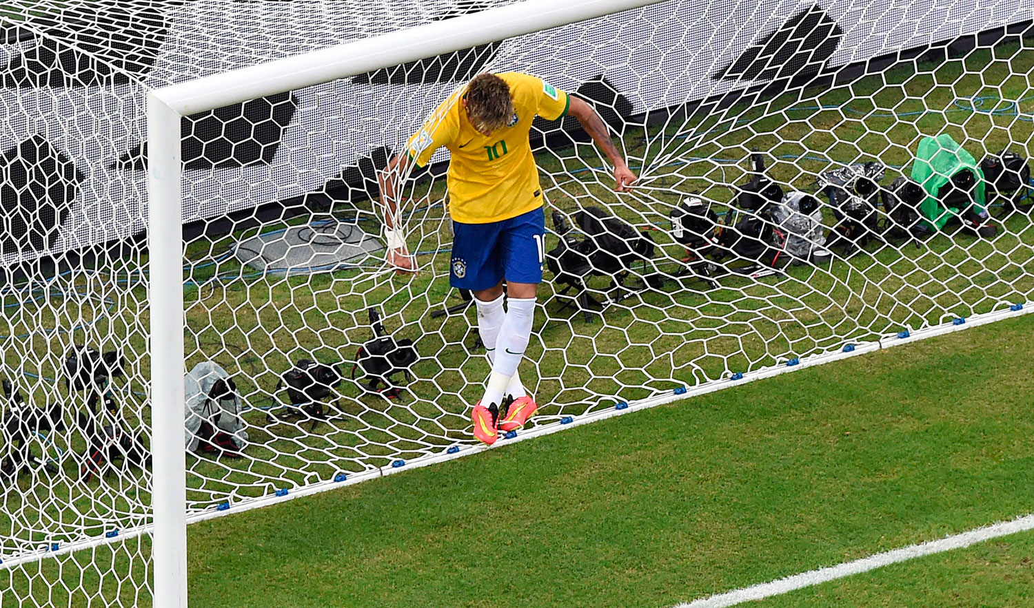 Brazil's forward Neymar reacts after missing a goal opportunity during a match between Brazil and Mexico in the Castelao Stadium in Fortaleza, Brazil on June 17, 2014.