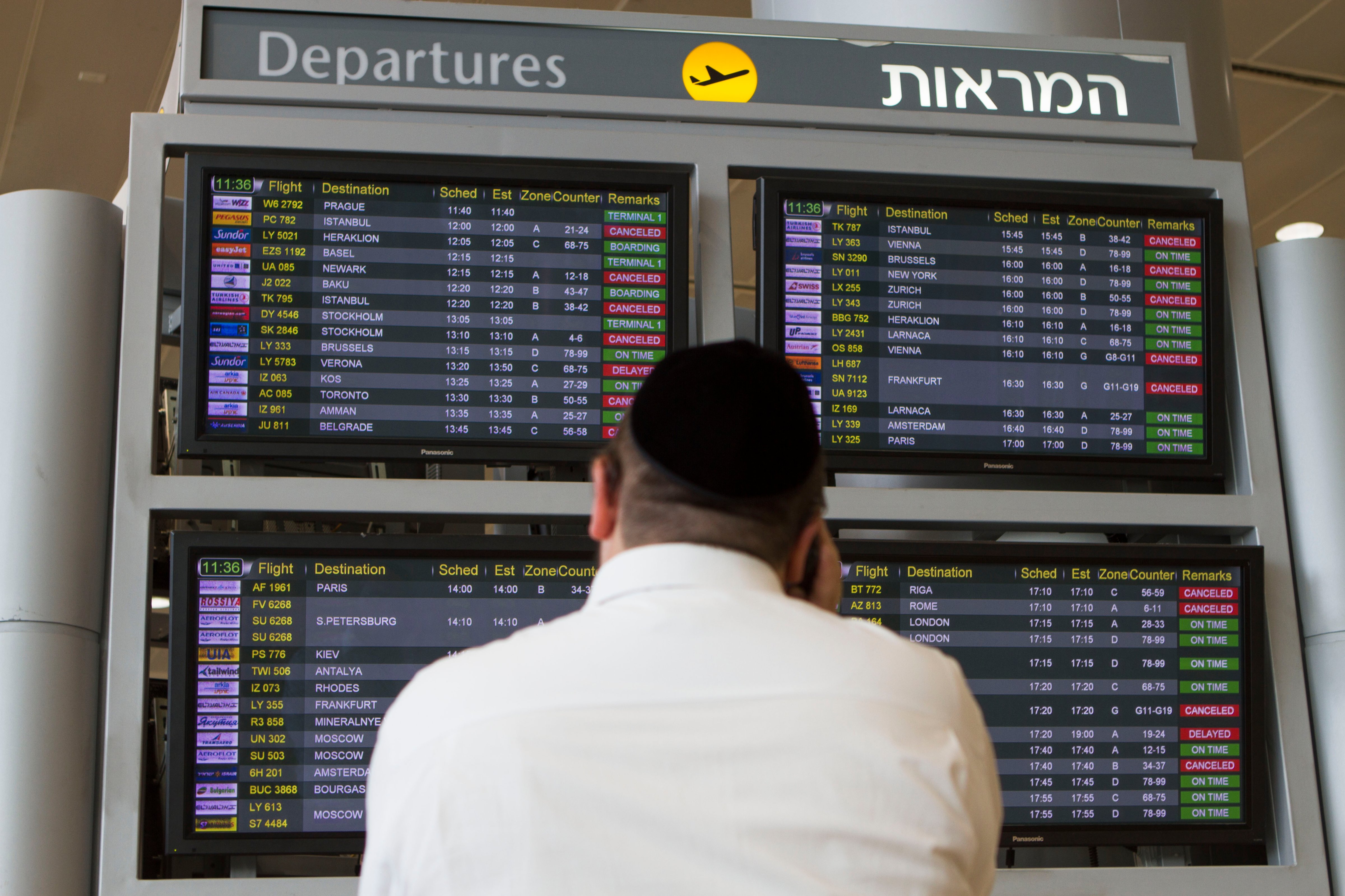 A departure flight board displays various canceled and delayed flights in Ben Gurion International airport a day after the U.S. Federal Aviation Administration imposed a 24-hour restriction on flights. The ban has now been lifted. (Dan Balilty—AP)