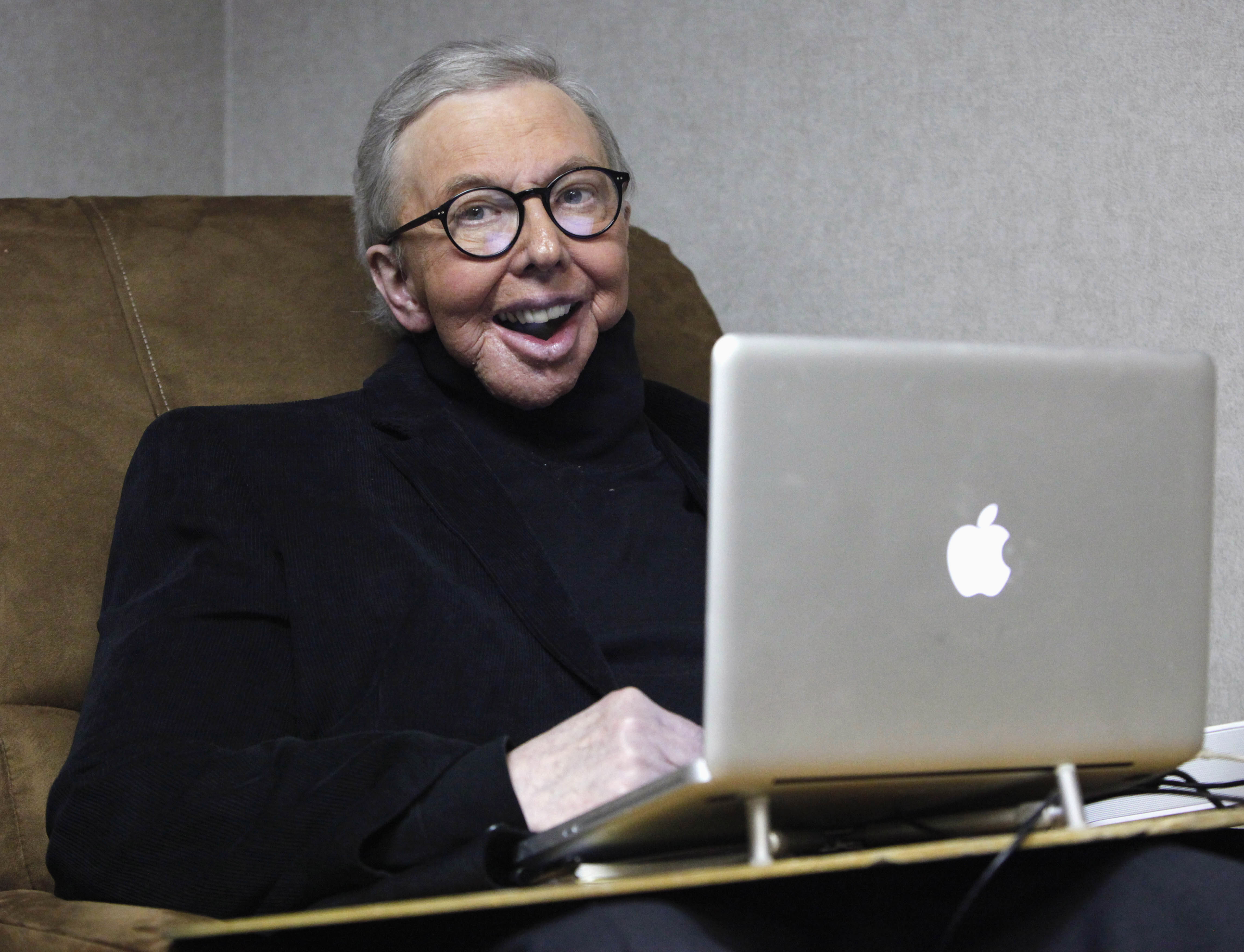Roger Ebert in 2011. (Charles Rex Arbogast—AP)