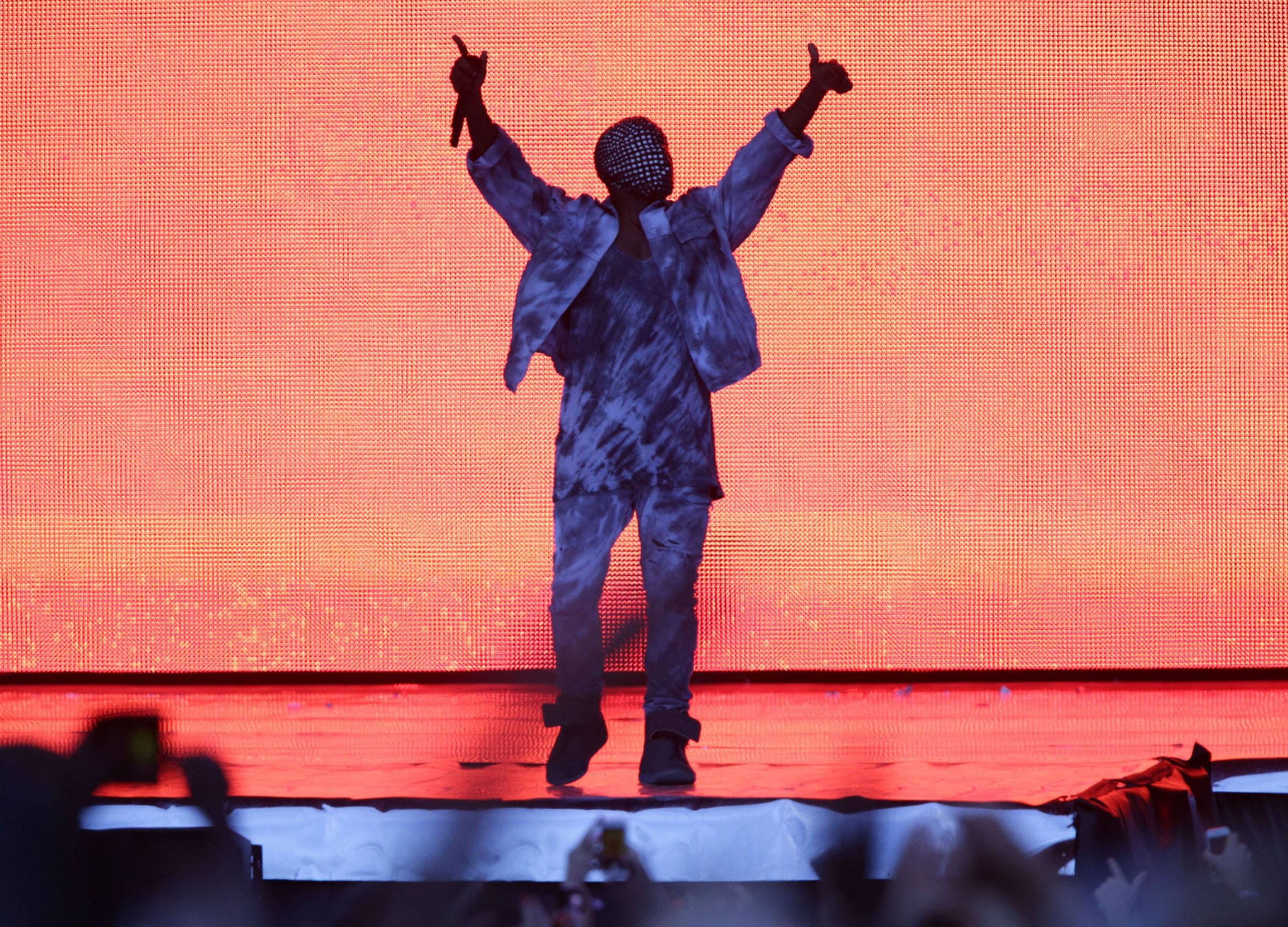 Kanye West performing at the Wireless Festival