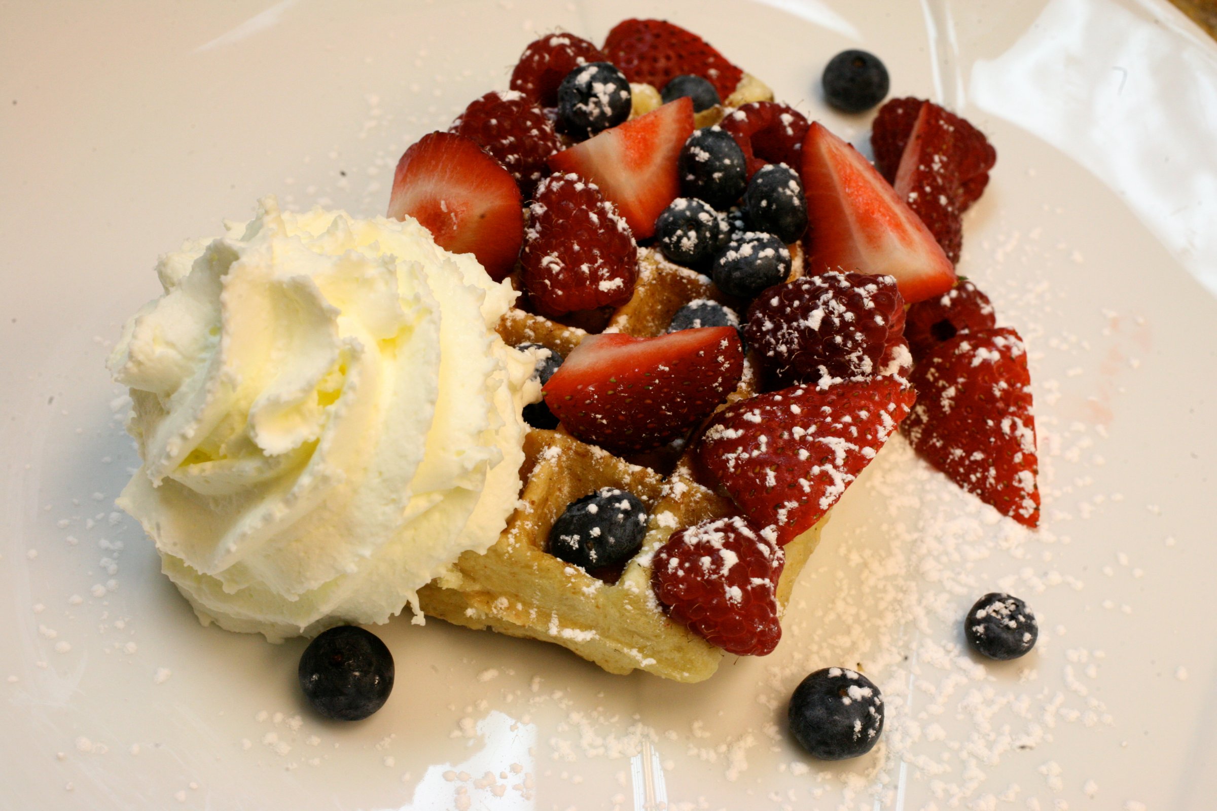 Liege waffle with fresh berries and whipped cream at Locolat in Washington, DC.