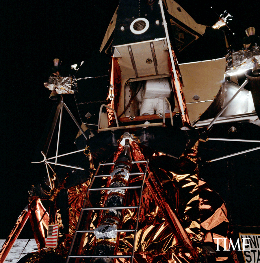 Buzz Aldrin descends the Lunar Module ladder