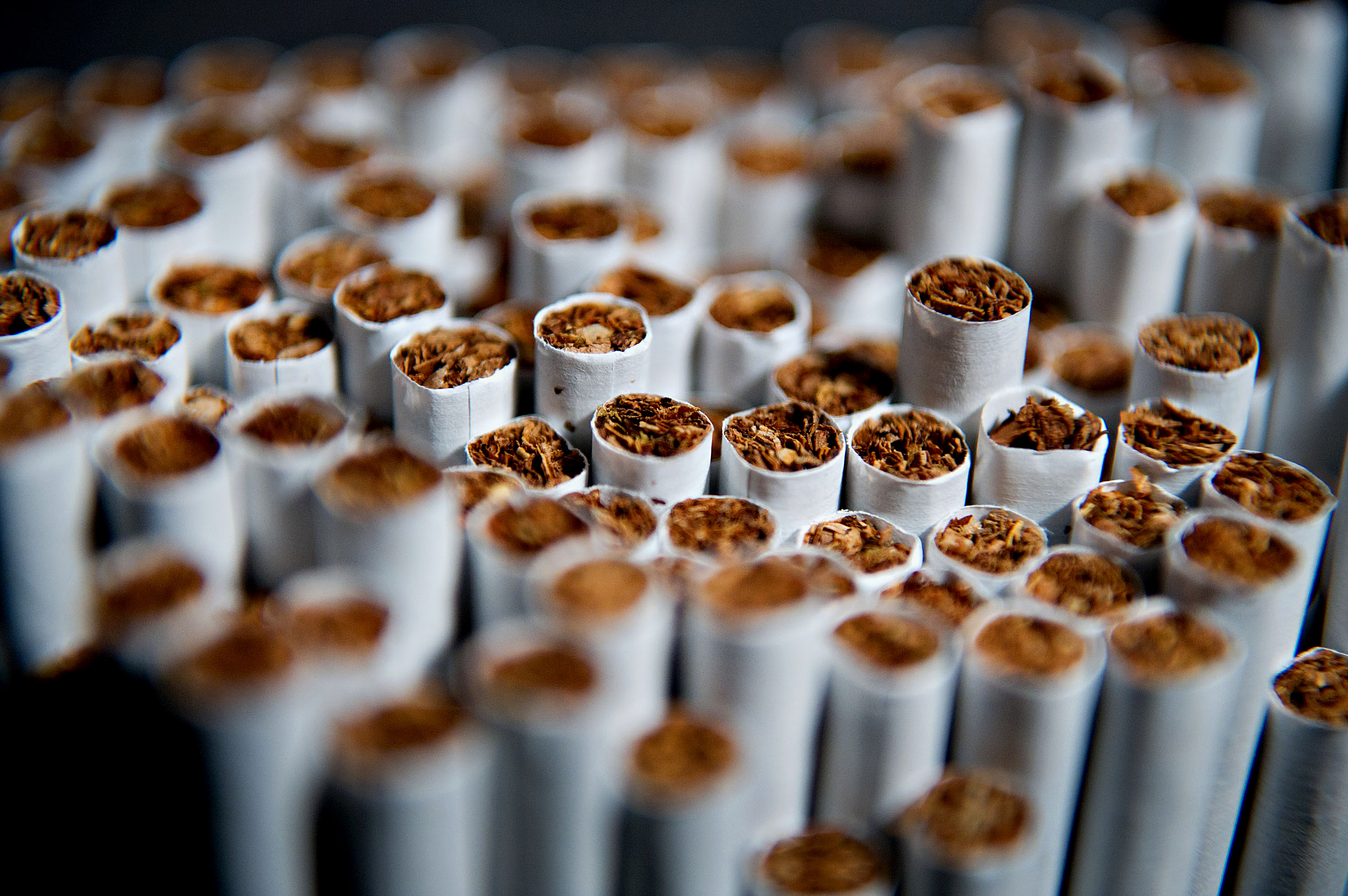 Several brands of cigarettes are arranged for a photograph in Tiskilwa, Illinois, U.S., on April 17, 2012. (Bloomberg/Getty Images)