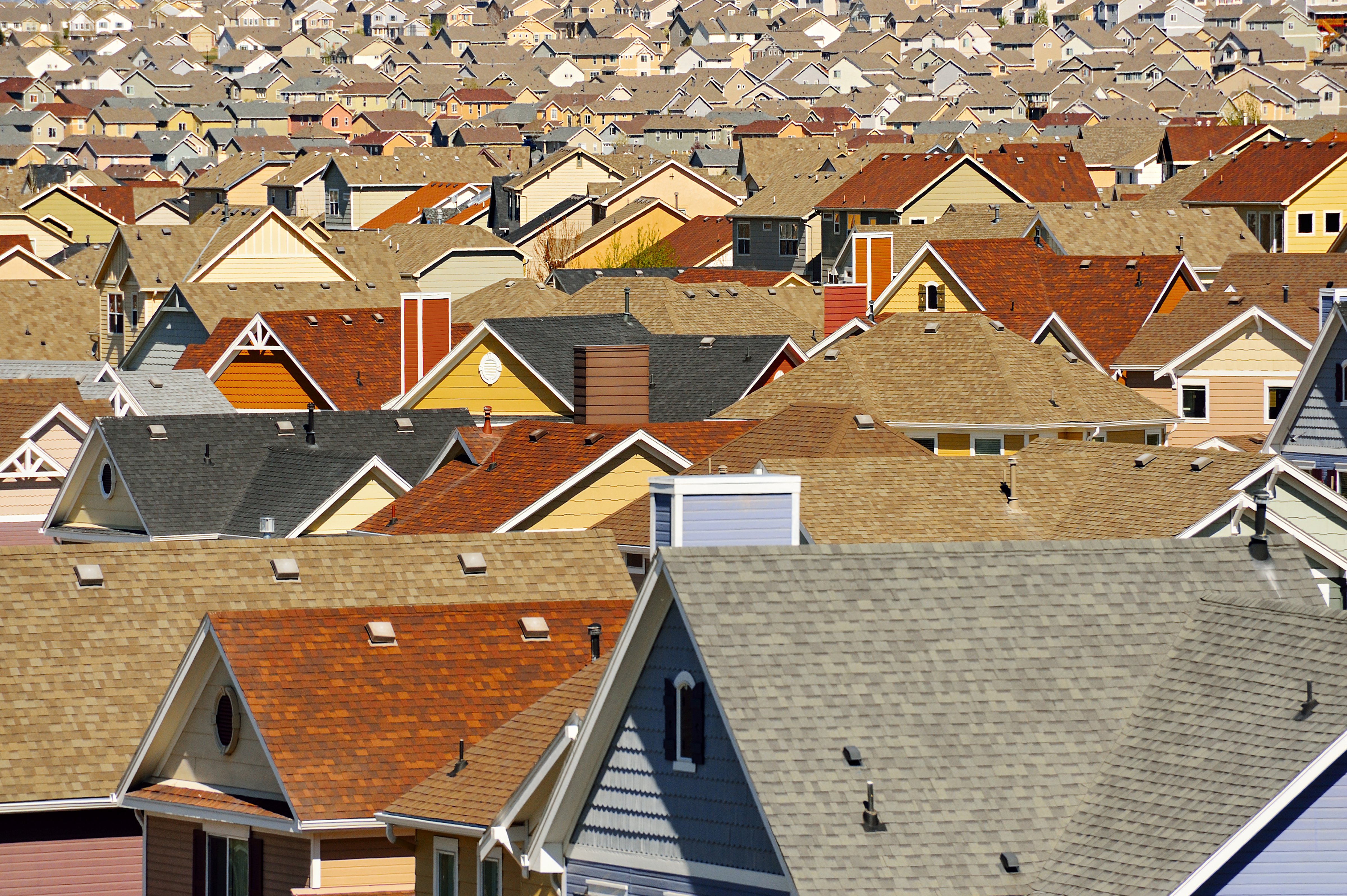 Rooftops in suburban development  in Colorado Springs, Colorado. (Blend Images/Spaces Images/Getty Images)