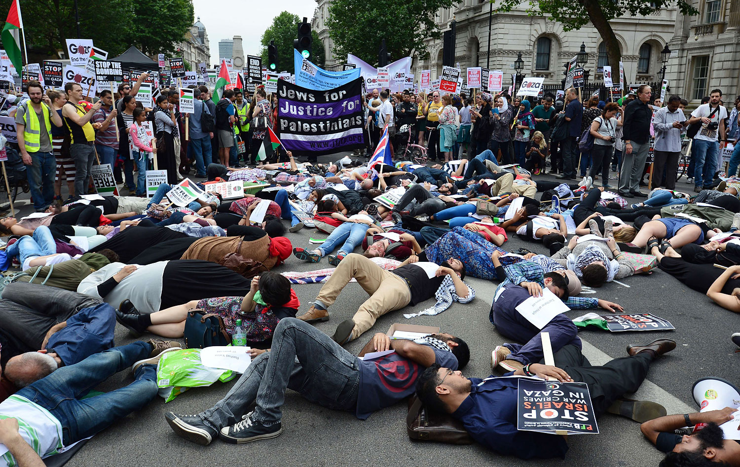 Protesters in demonstration against Israeli airstrikes in Gaza in central London on July 19, 2014. (Carl Court—AFP/Getty Images)