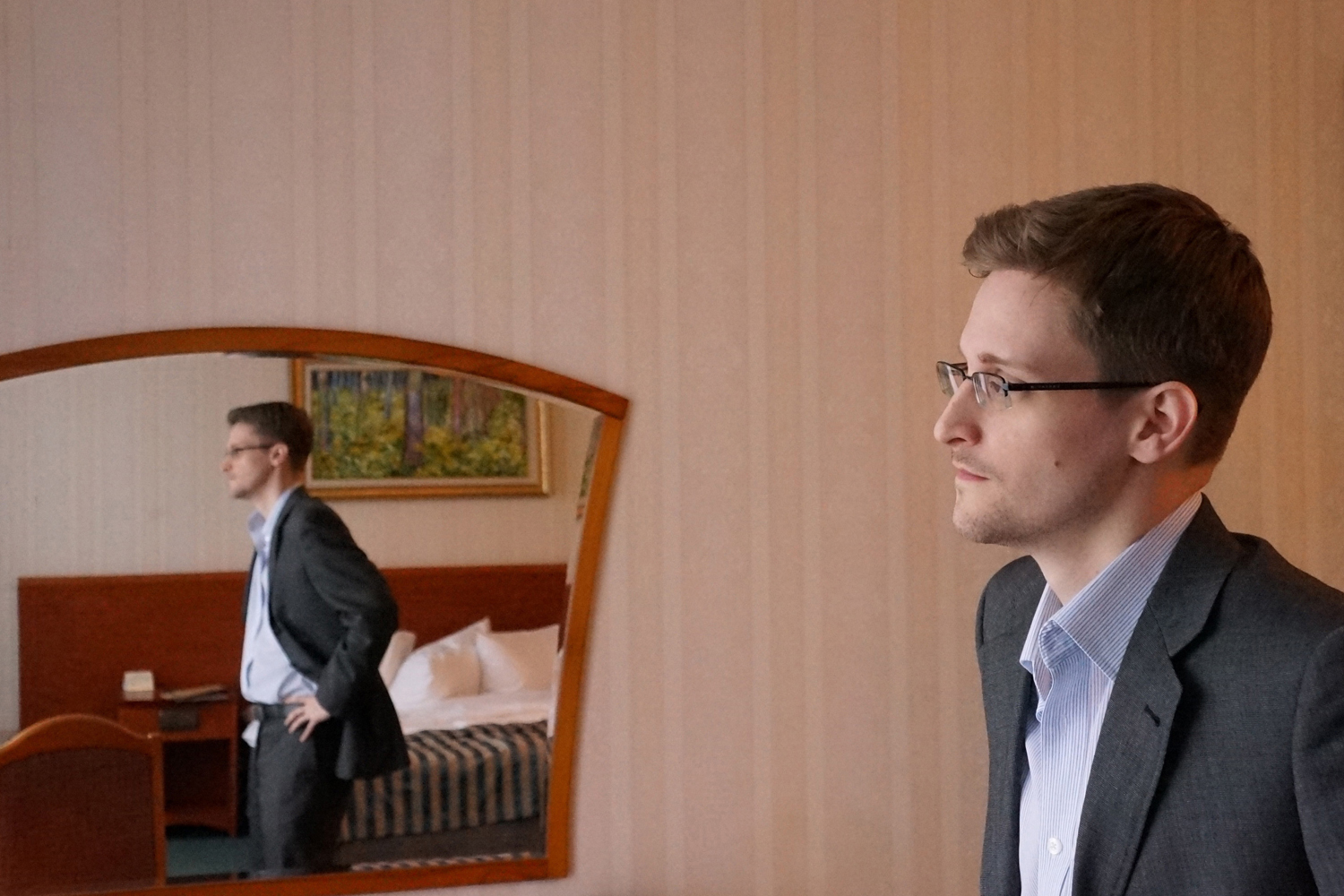 Former intelligence contractor Edward Snowden poses for a photo during an interview in an undisclosed location in December 2013 in Moscow.