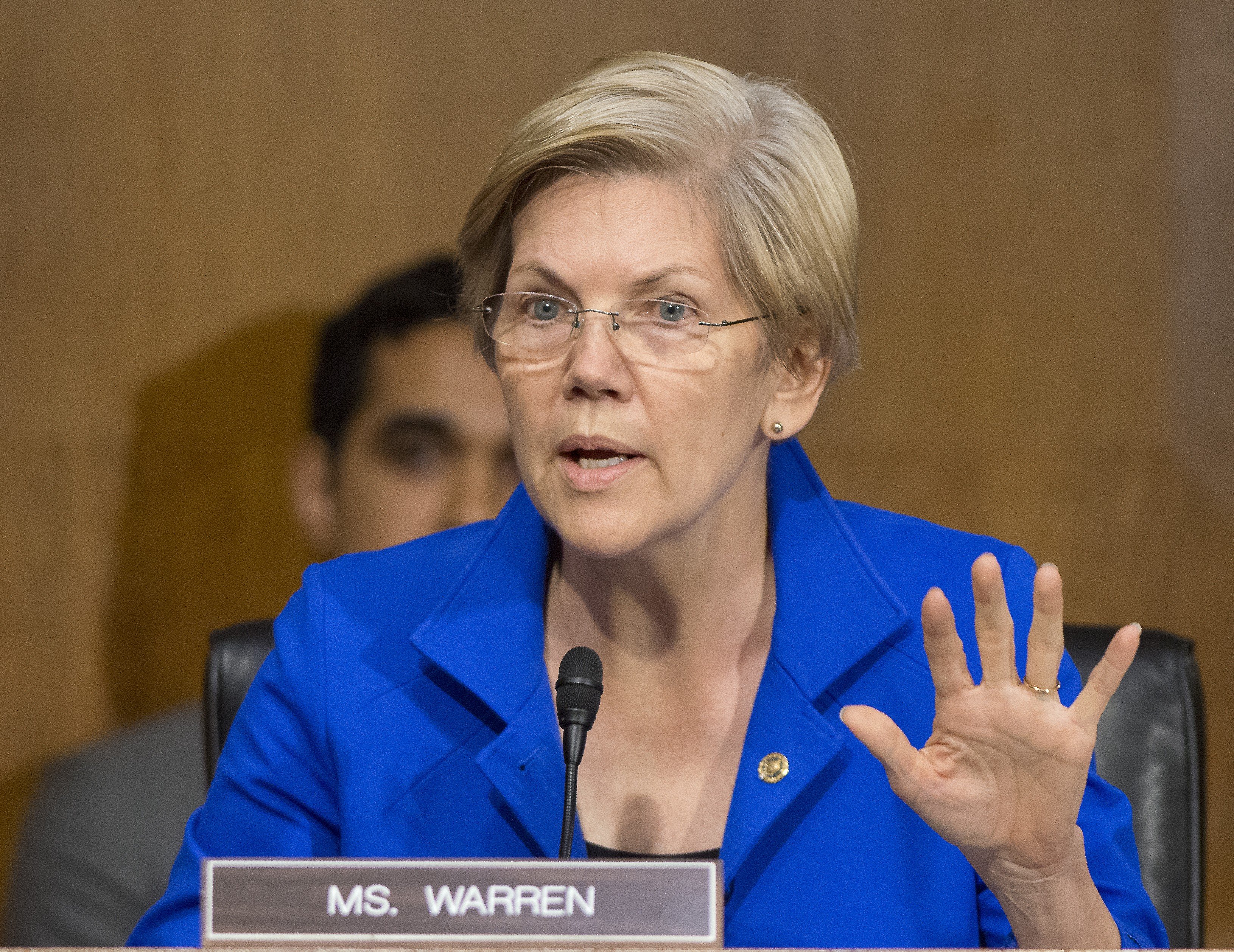 Senator Elizabeth Warren (Democrat of Massachusetts) listens to testimony from Janet L. Yellen on "The Semiannual Monetary Policy Report to the Congress." on Capitol Hill in Washington on July 15, 2014. (Ron Sachs—Corbis)