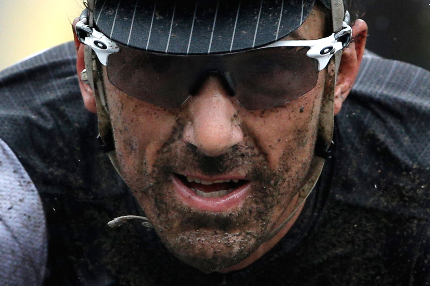 Switzerland's Fabian Cancellara crosses the finish line of the fifth stage of the Tour de France cycling race in Arenberg, France, on July 9, 2014.