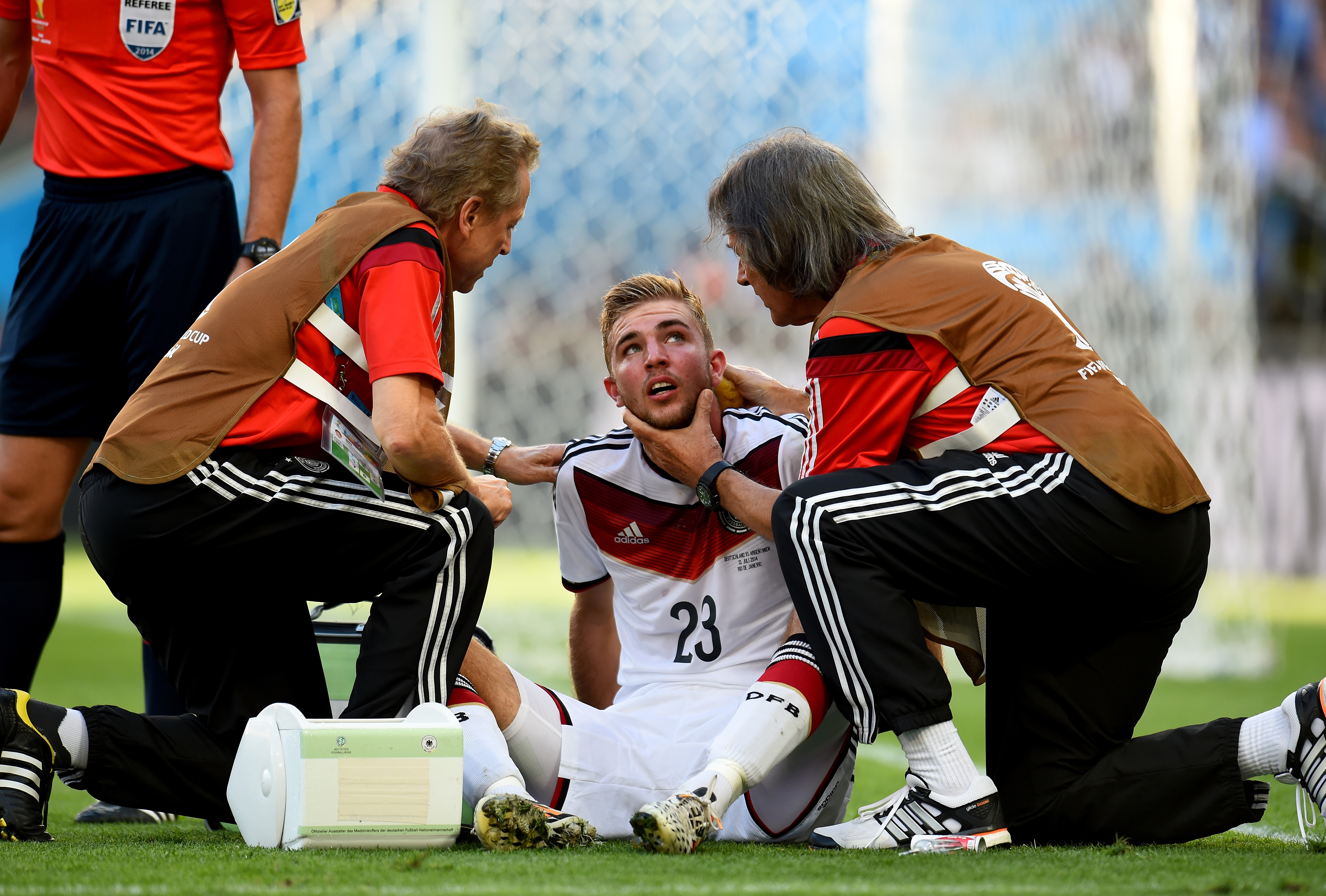 Christoph Kramer of Germany receives a medical treatment during the 2014 FIFA World Cup Brazil Final match between Germany and Argentina on July 13, 2014 in Rio de Janeiro. (Shaun Botterill—FIFA/Getty Images)