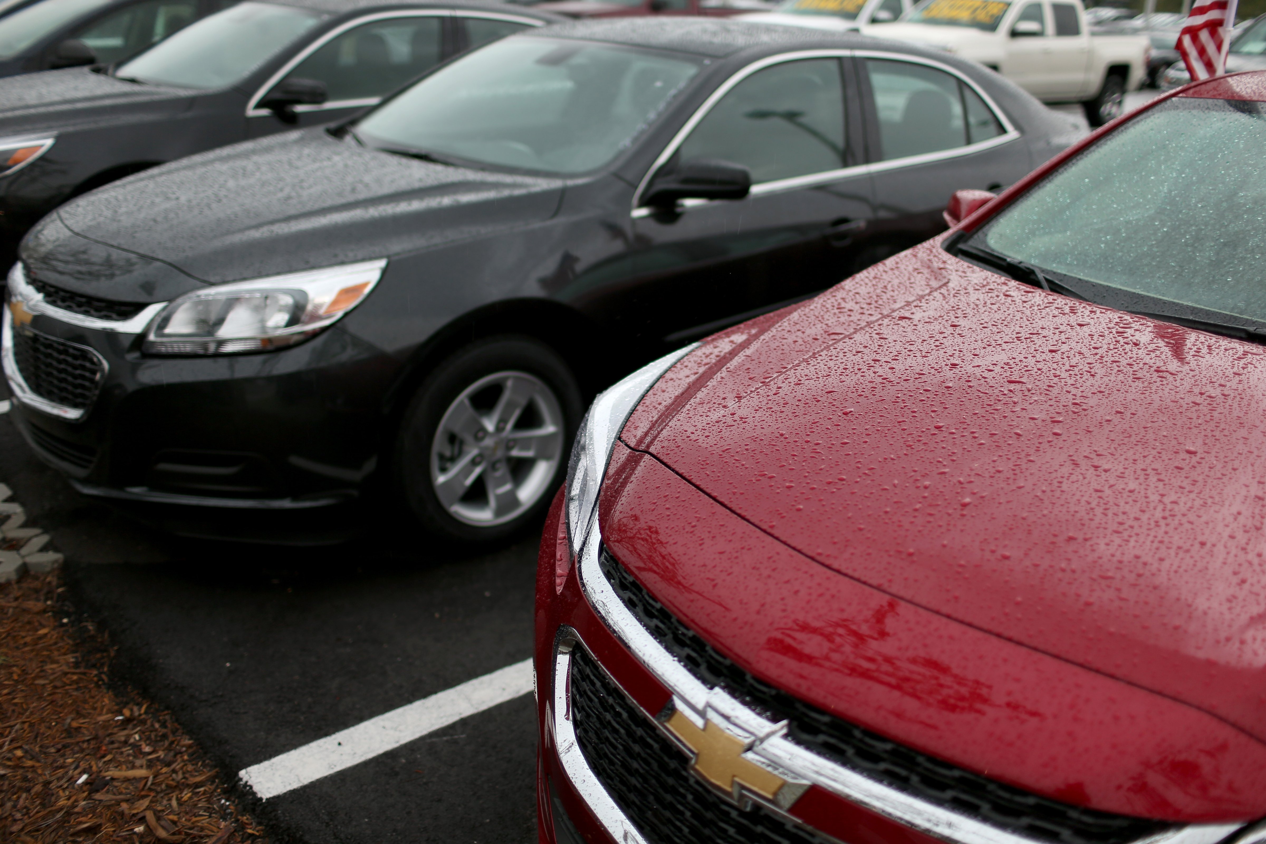 General Motors Chevrolet vehicles are seen on a sales lot on June 30, 2014 in Miami, Florida. (Joe Raedle—Getty Images)