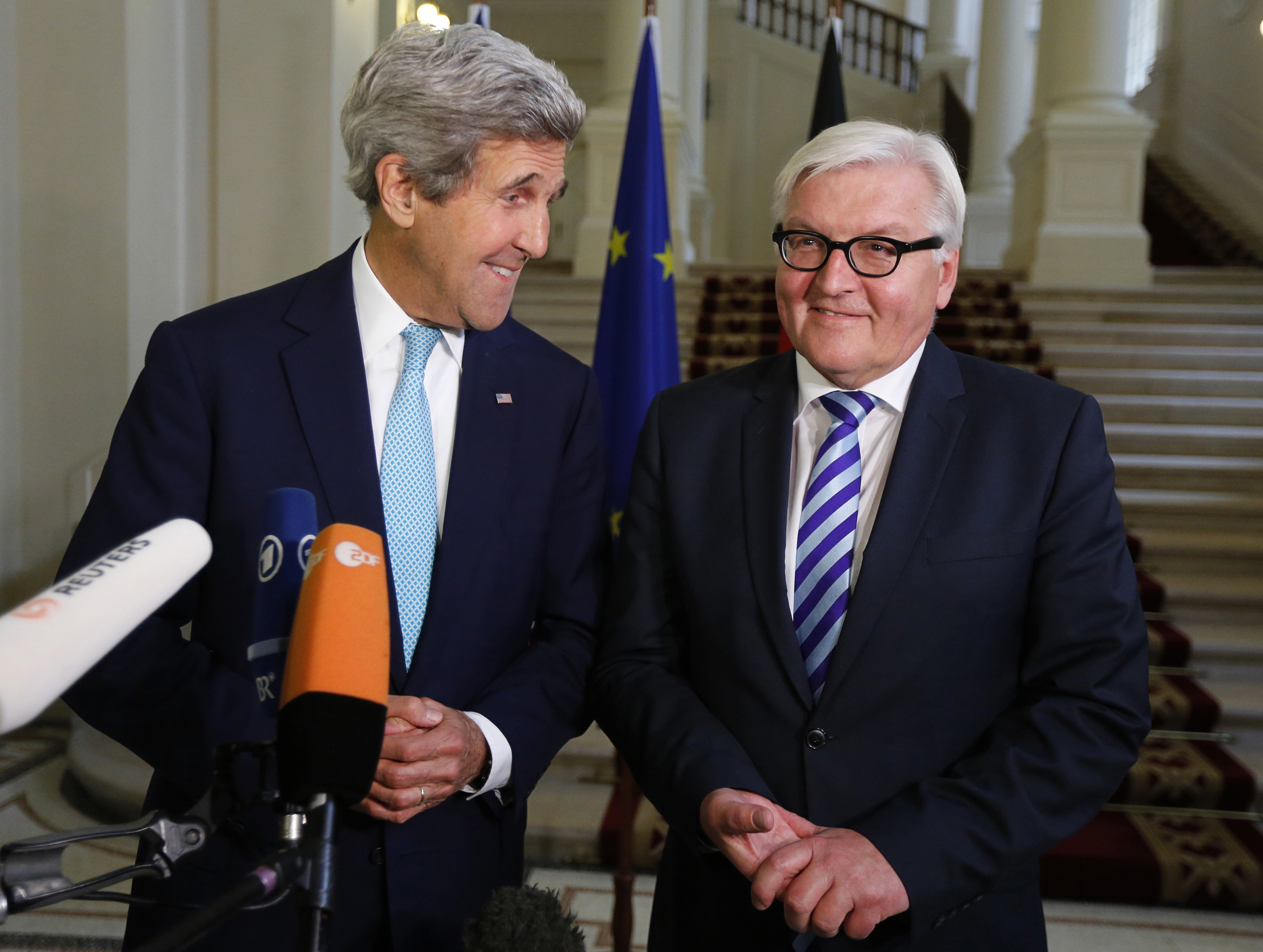 U.S. Secretary of State John Kerry, left and German Foreign Minister Frank-Walter Steinmeier during a press conference, after talks between the foreign ministers of the six powers negotiating with Tehran on its nuclear program, in Vienna, Austria on July 13, 2014. 
