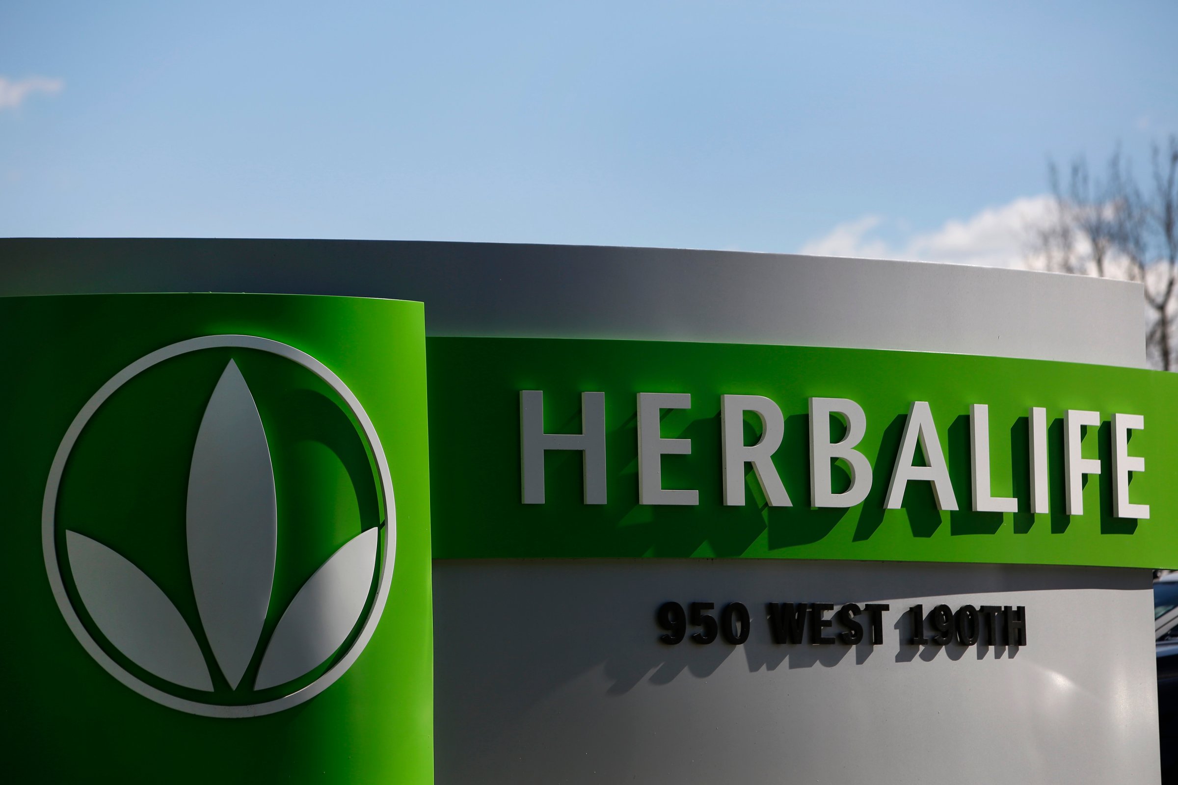 Herbalife Ltd. signage is displayed outside of Herbalife Plaza in Torrance, Calif. on Feb. 3, 2014.