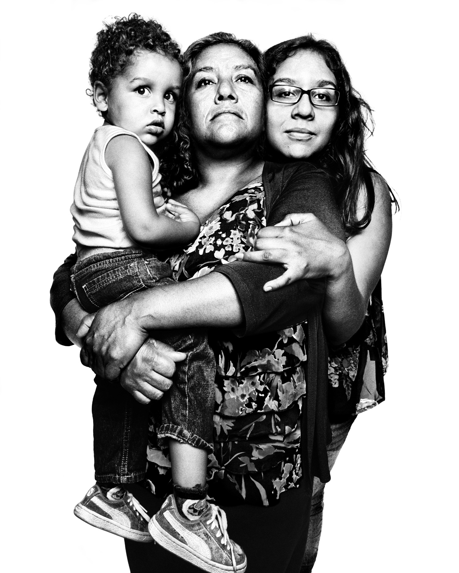 Melida Ruiz, 52 | 
                              New York City | 
                              June 14, 2013
                              
                              Ruiz, pictured with her daughter Mercedez, 19, and grandson Christopher, 1, is a legal resident who was arrested in 2011 and detained for seven months while she fought deportation based on a 2002 misdemeanor drug conviction.