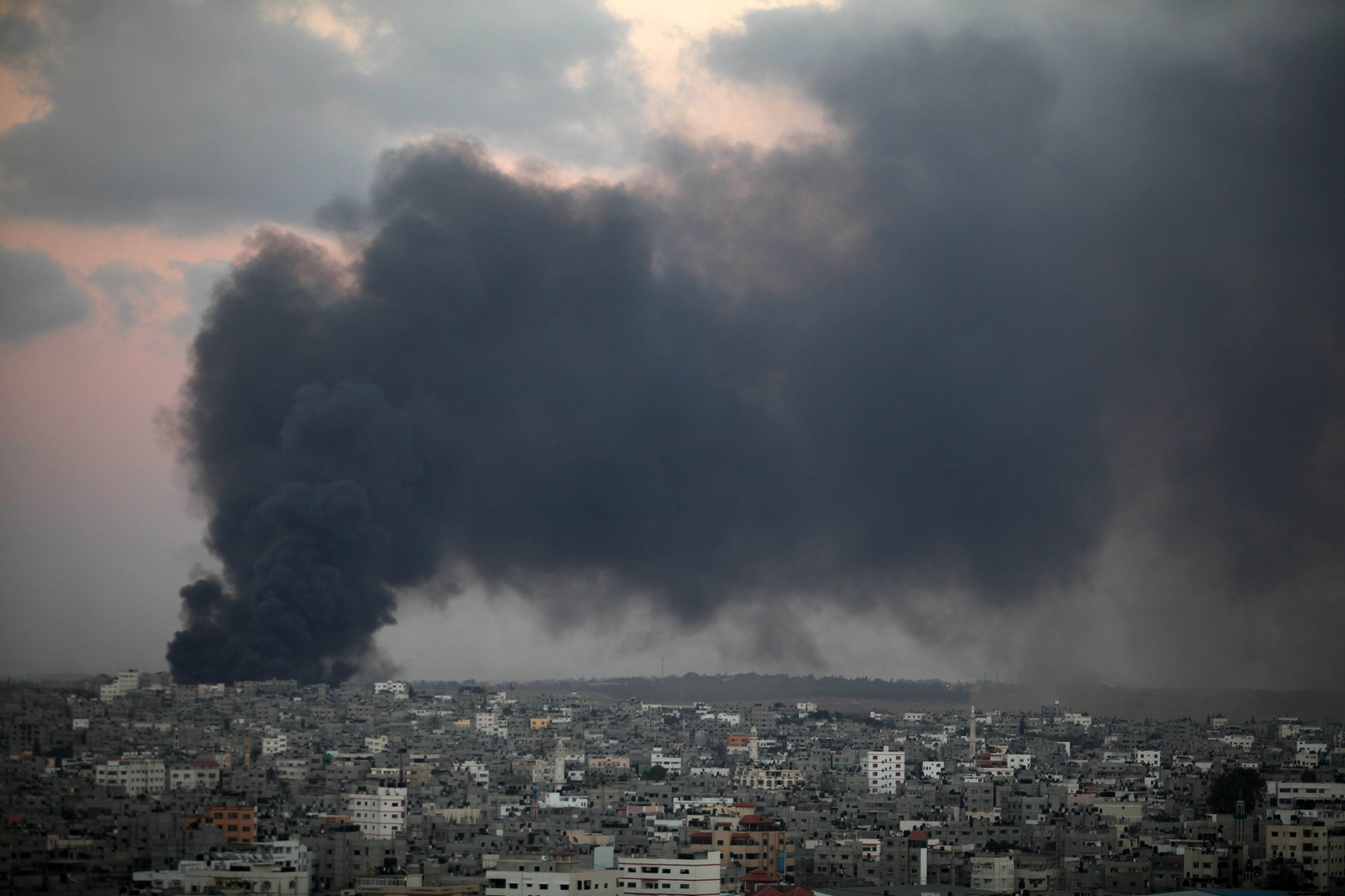 Smoke from an Israeli strike rises over the Gaza Strip, July 25, 2014.