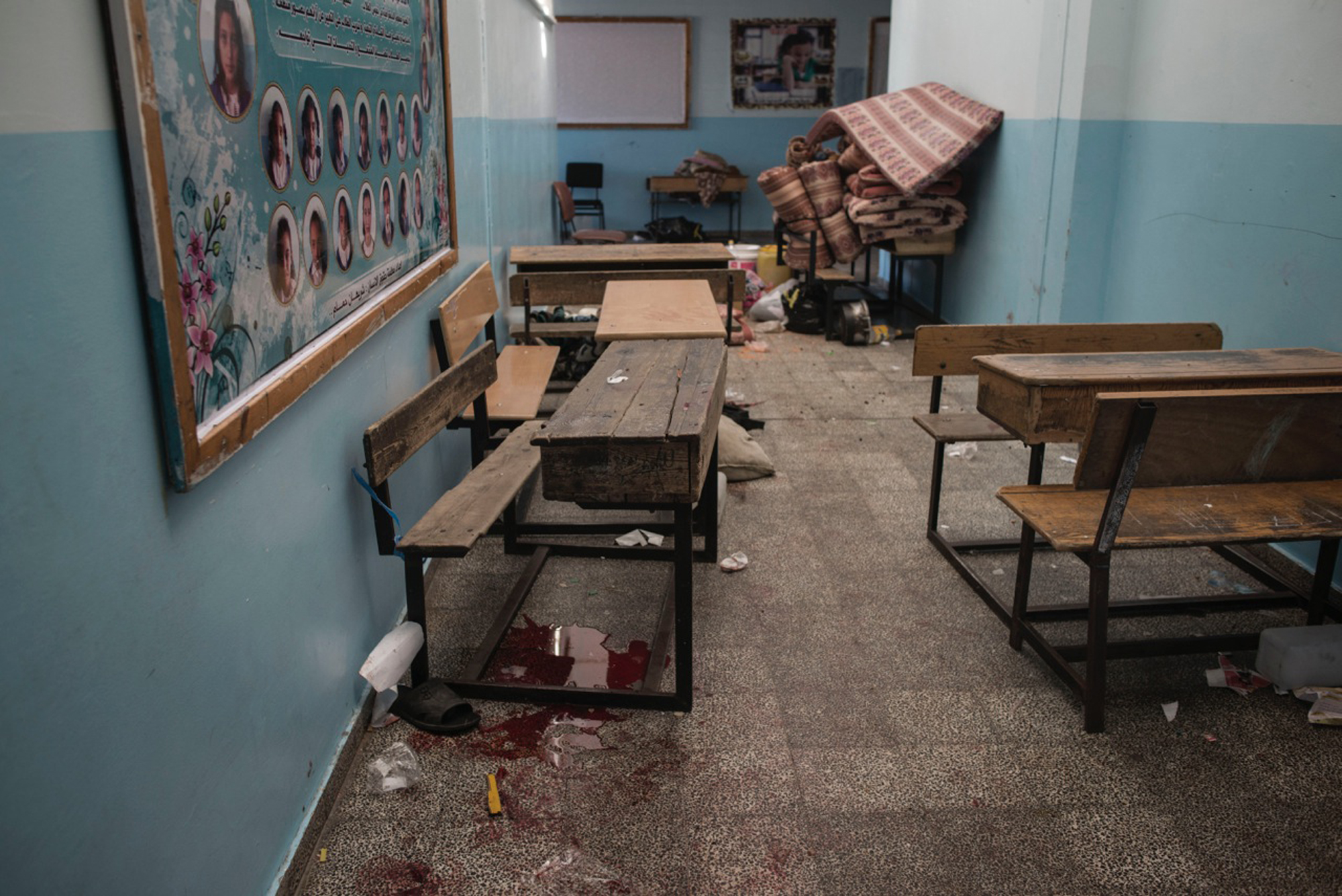 Blood stains of displaced Palestinians are seen inside the UNRWA school in Beit Hanoun after it has been hit, Gaza Strip, July 24, 2014.