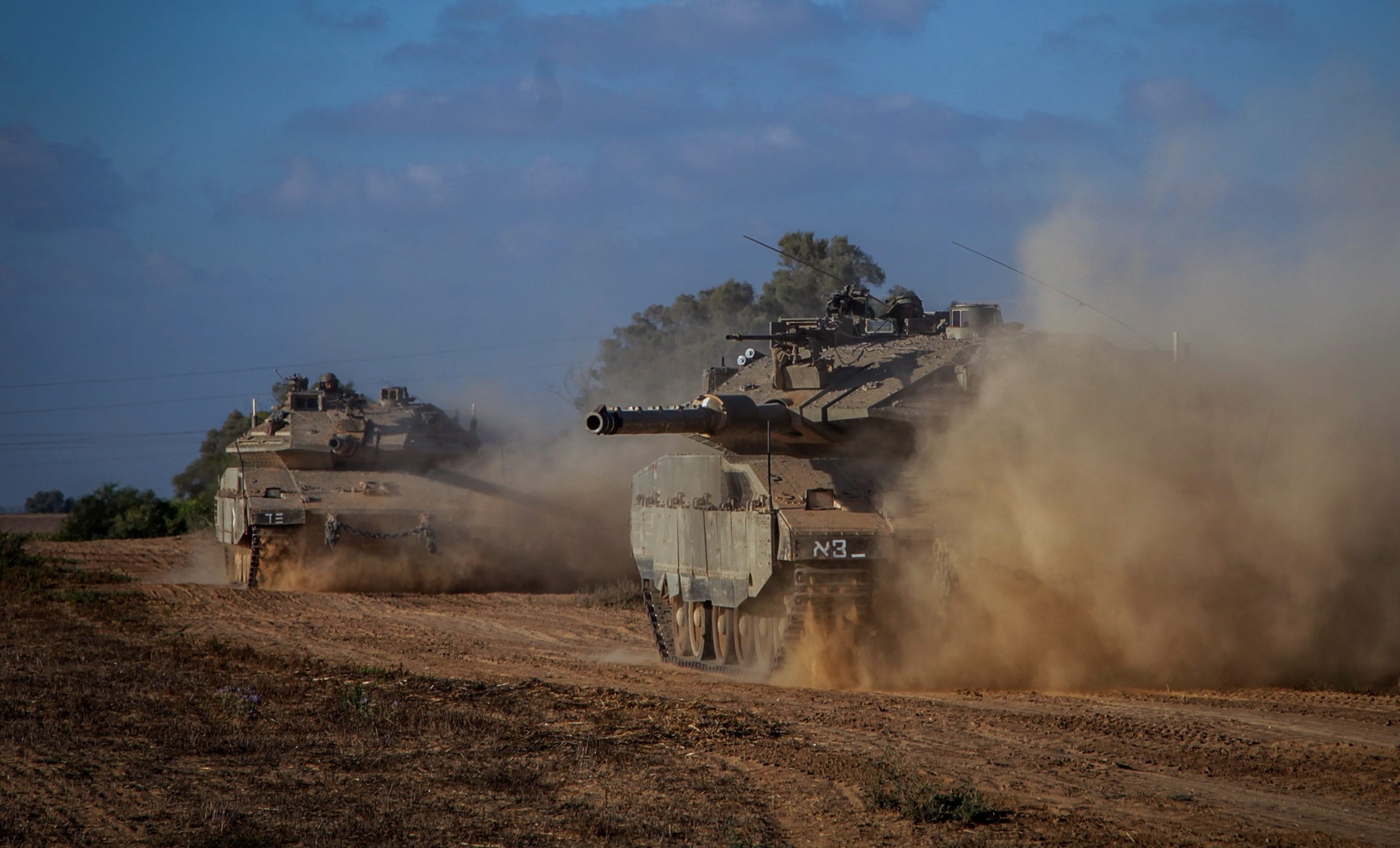 Israeli Markava tanks heading toward the Israeli-Gaza border early on July 18, 2014.