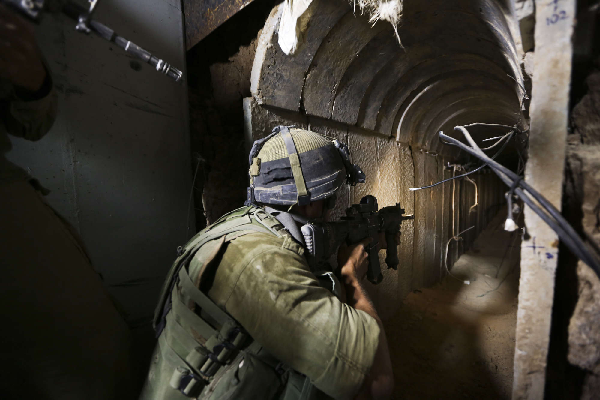IDF soldiers of the Paratroopers Brigade guarding and neutralizing tunnels that were dug by the Hamas organization and leading into Israel,  Khan Younis, Gaza, July 30, 2014. (Ziv Koren—Polaris)