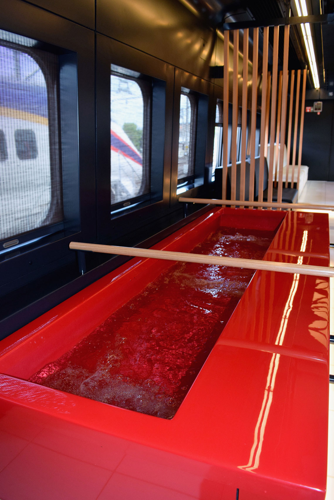 The interior of the footbath car on East Japan Railway Co.'s new 'Toreiyu Tsubasa' train on June 30, 2014 in Yamagata, Japan. Passengers will be able to relieve aching feet with a 2.4-meter-long footbath, and then congregate in a lounge for drinks, on the Yamagata Shinkansen Line starting July 19 for a limited run until September.