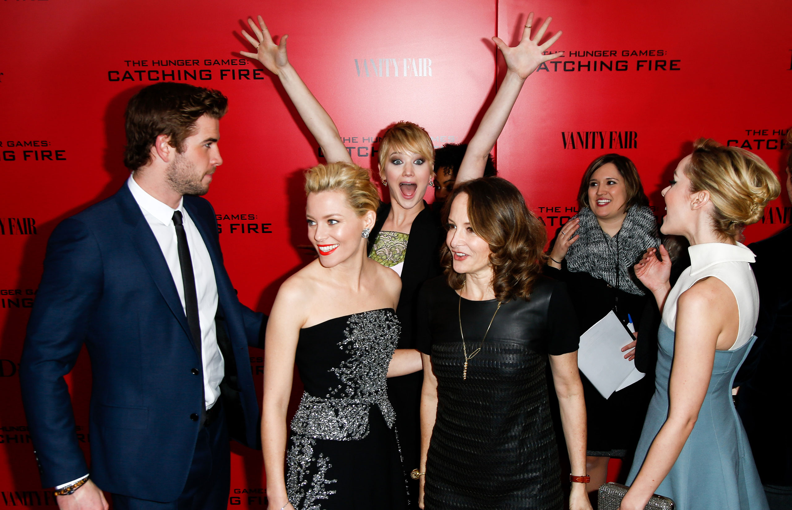 Jennifer Lawrence photobombs fellow cast members at the special screening of  The Hunger Games: Catching Fire  at the AMC Lincoln Square Theater on November 18, 2013 in New York City.